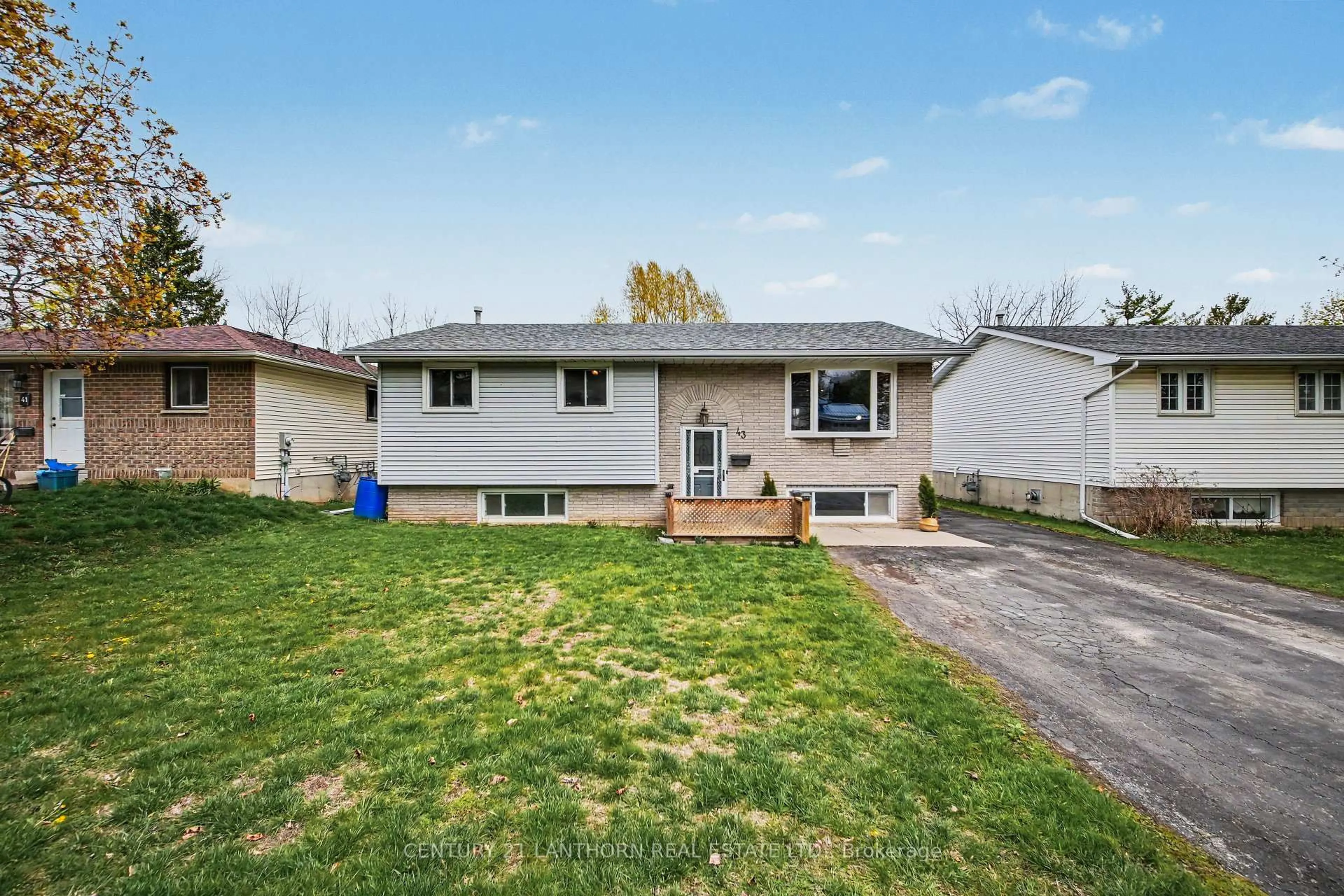 Home with vinyl exterior material, street for 43 Ireland Dr, Quinte West Ontario K8V 5X4