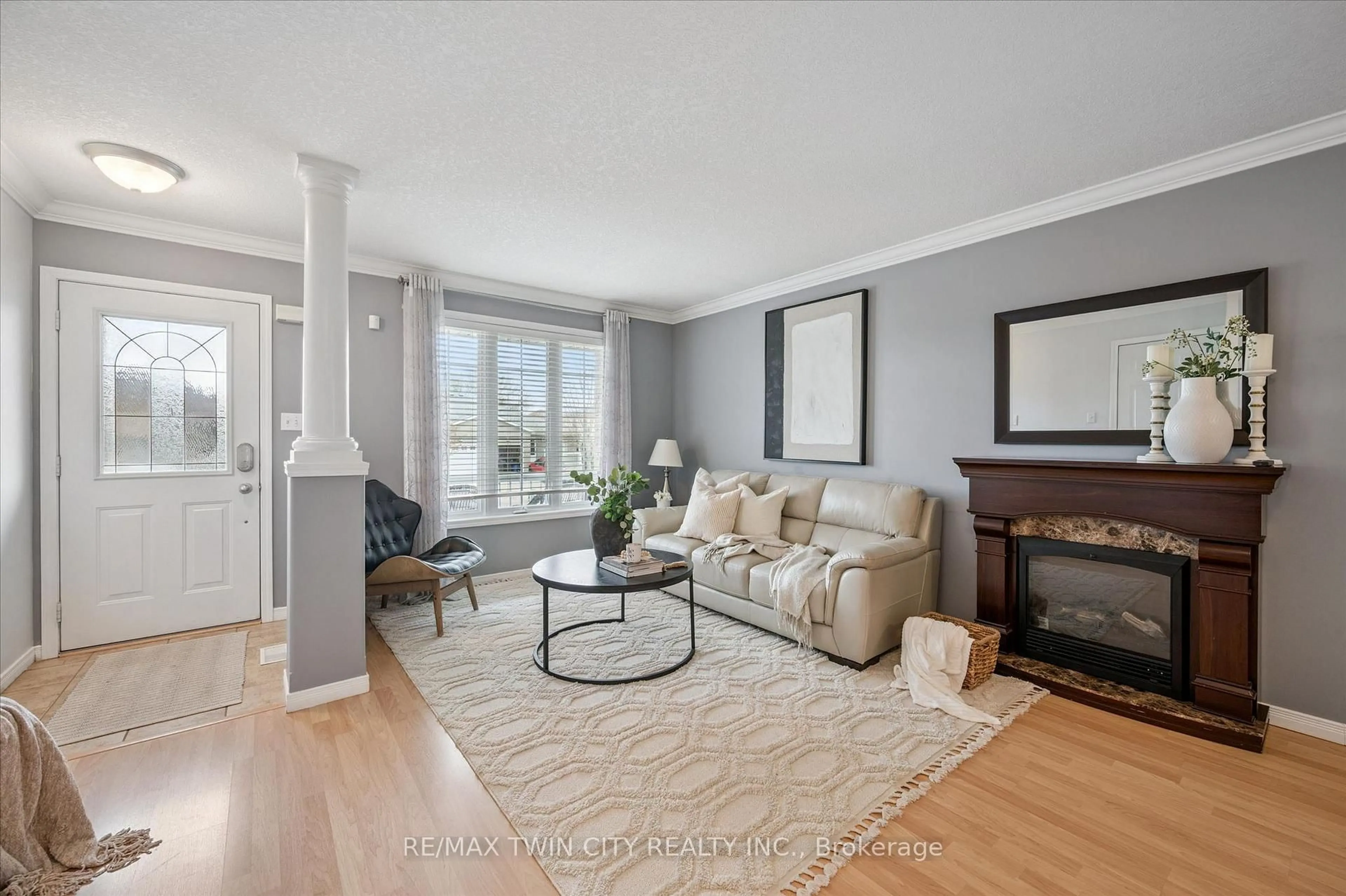 Living room with furniture, wood/laminate floor for 6 Mosser Dr, Cambridge Ontario N1P 1H9
