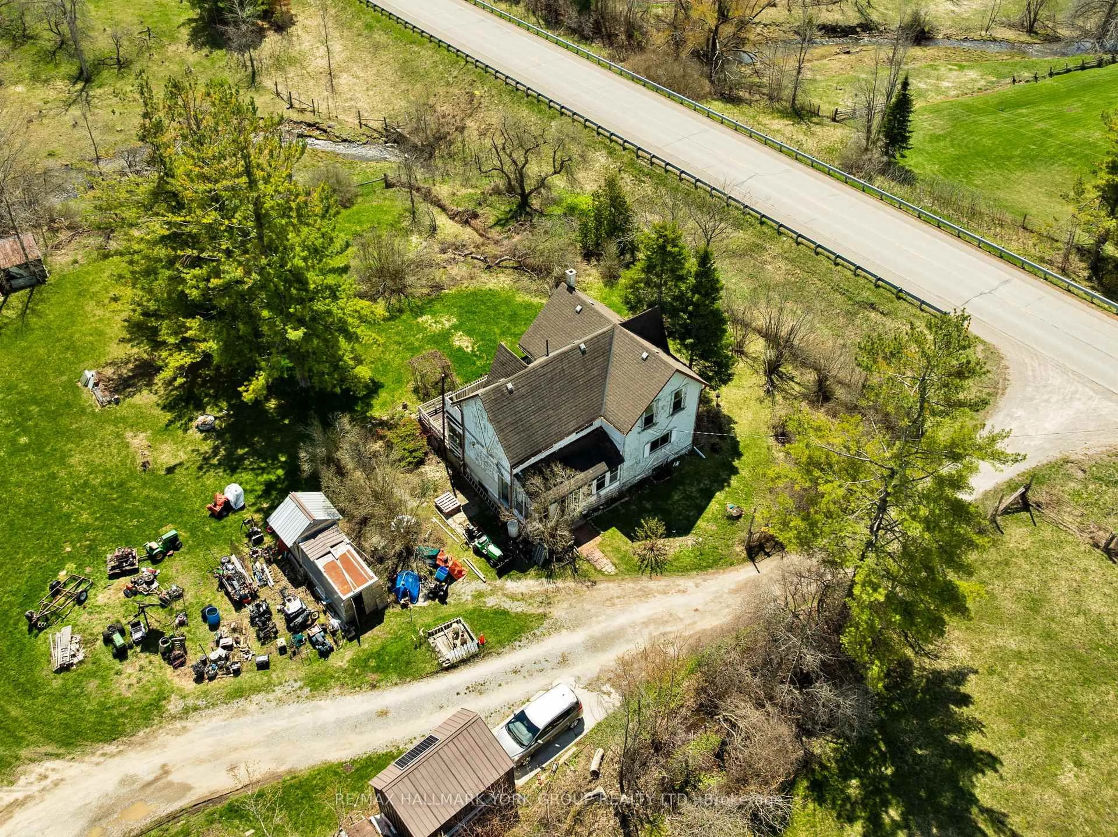 A pic from outside/outdoor area/front of a property/back of a property/a pic from drone, street for 2468 County Road 46, Kawartha Lakes Ontario K0M 2T0