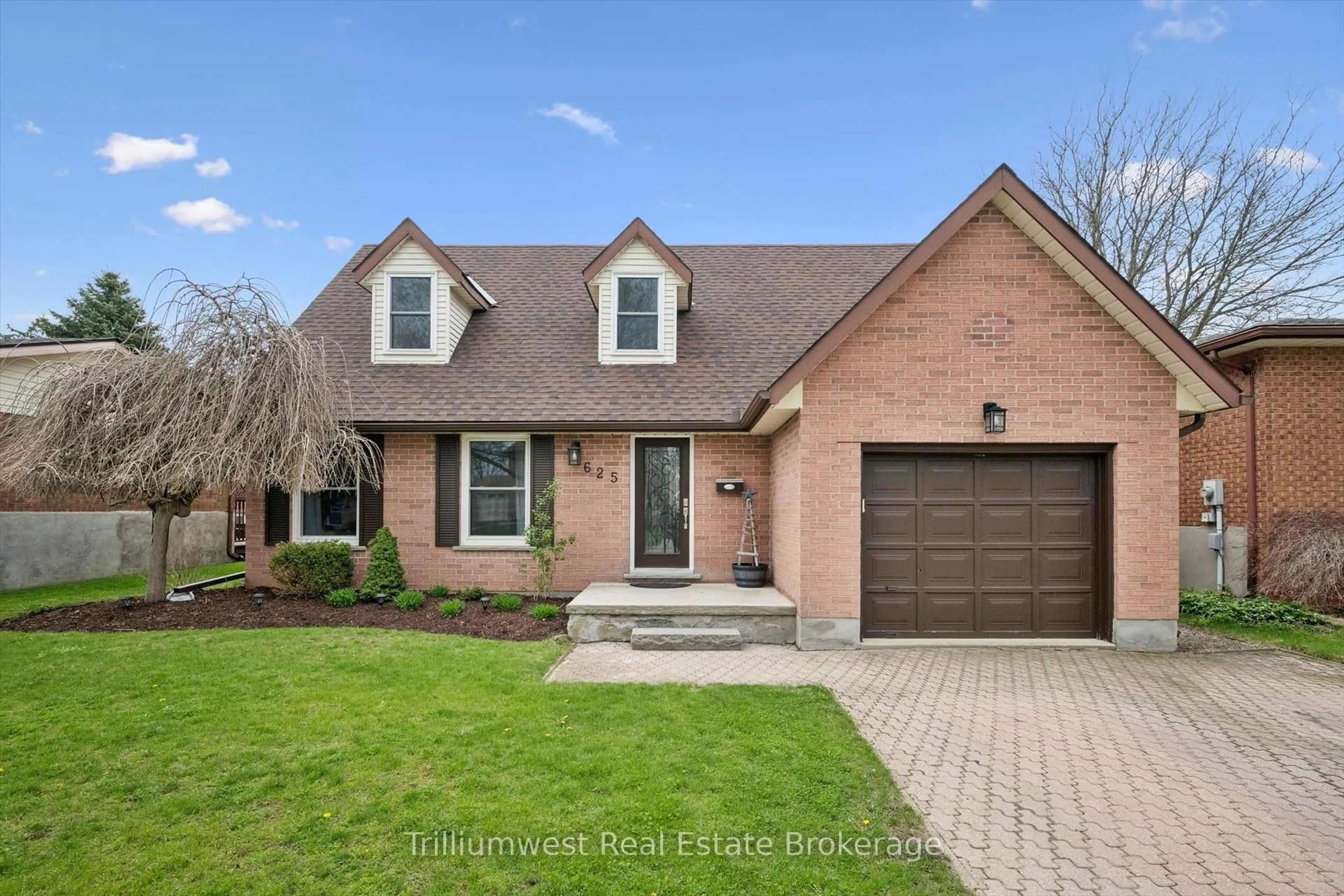 Home with brick exterior material, street for 625 Pine Island Cres, Waterloo Ontario N2V 1T3