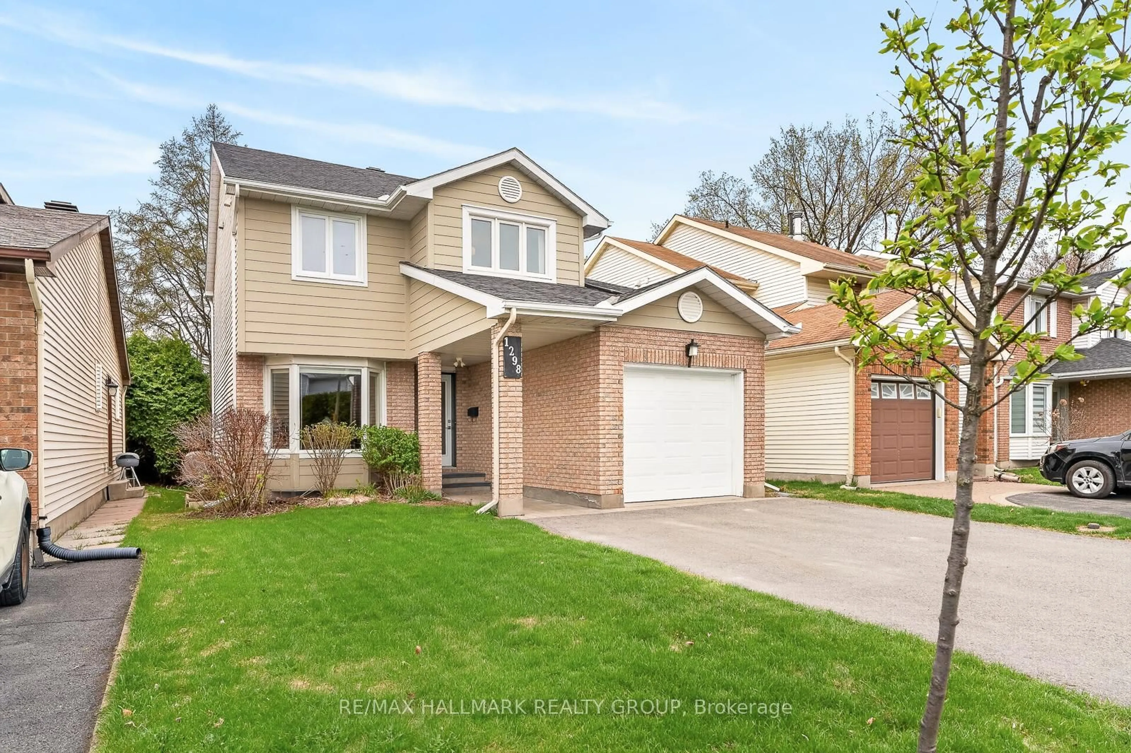 Home with brick exterior material, street for 1298 Famlit Crt, Ottawa Ontario K1J 9A1