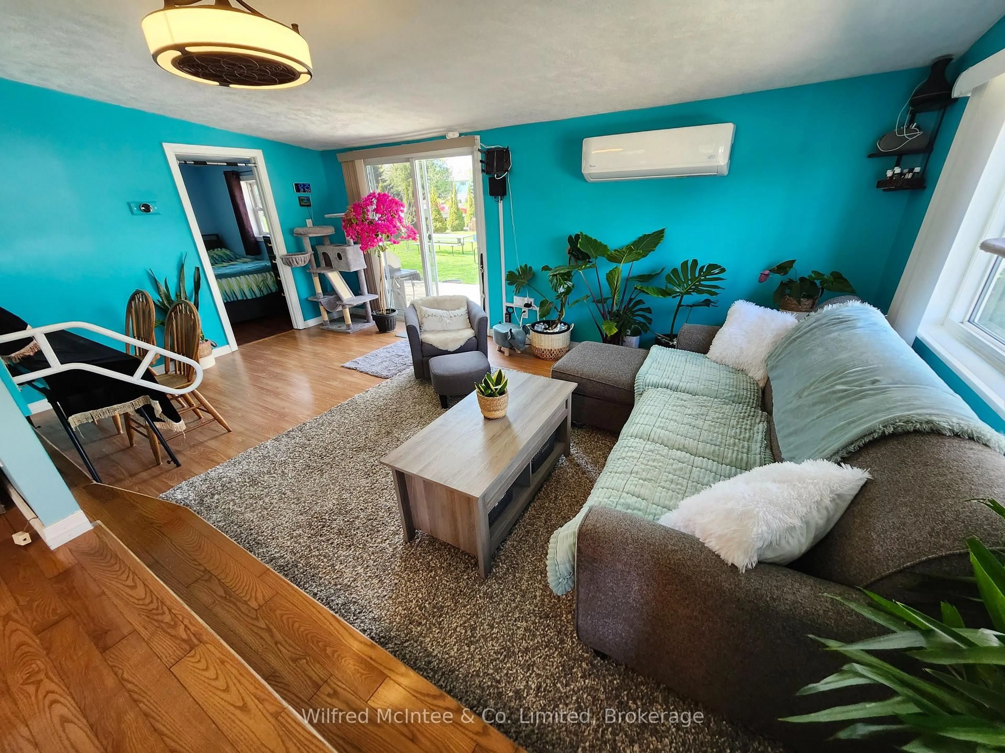 Living room with furniture, wood/laminate floor for 263 MCCONNELL St, North Huron Ontario N0M 1H0