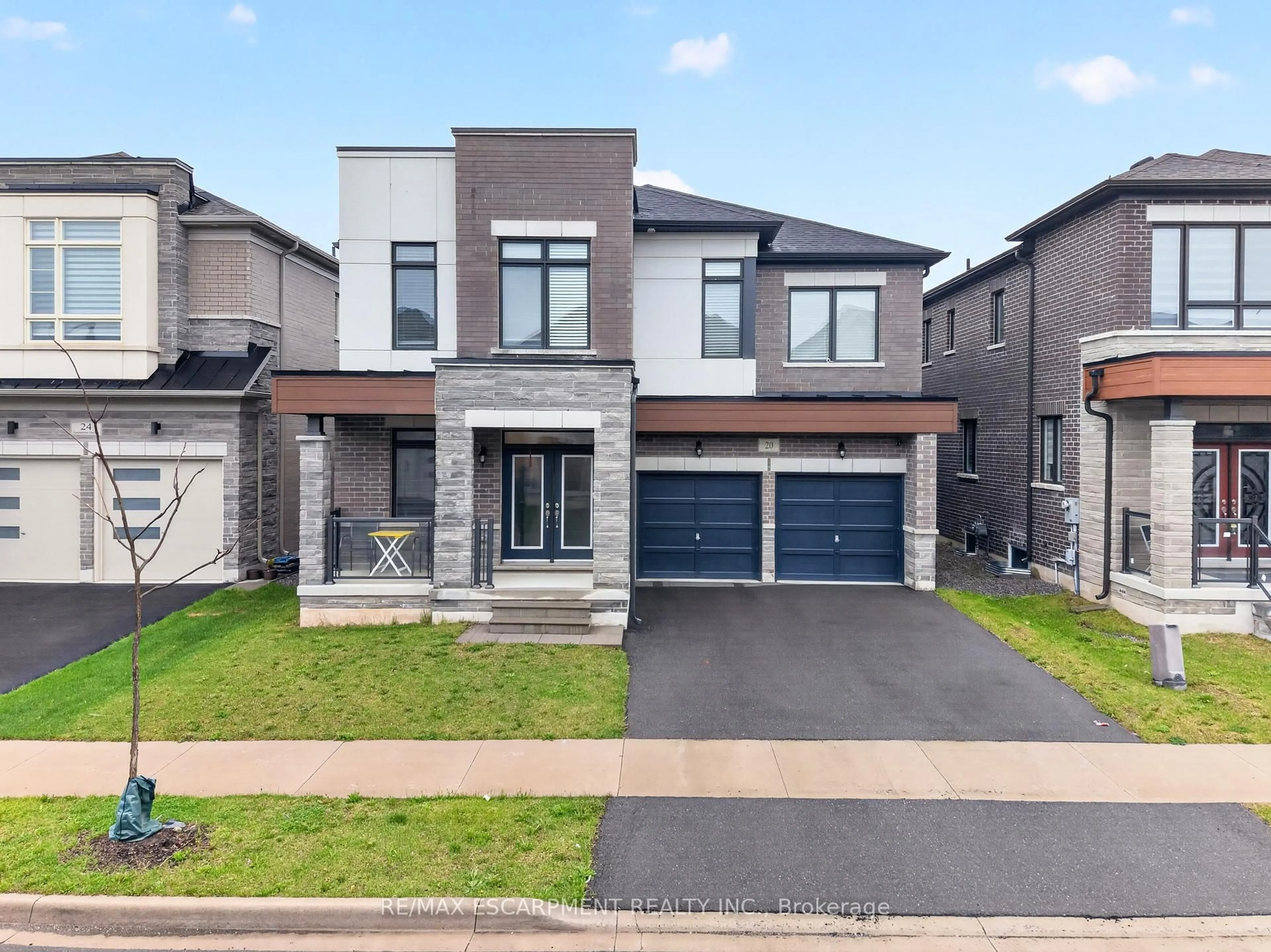 Home with brick exterior material, street for 20 Zimmerman Gdns, Hamilton Ontario L8B 1Y9