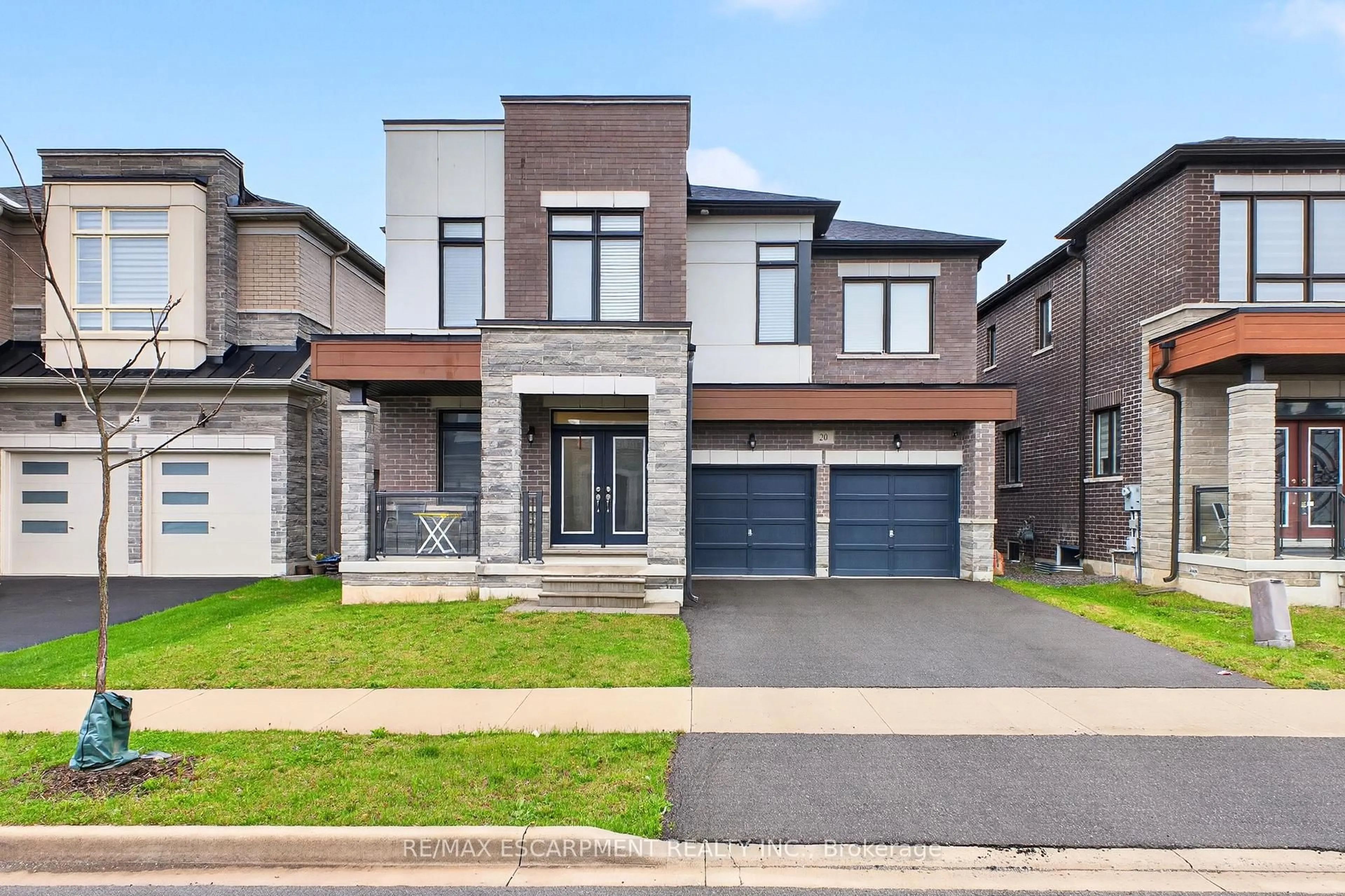 Home with brick exterior material, street for 20 Zimmerman Gdns, Hamilton Ontario L8B 1Y9