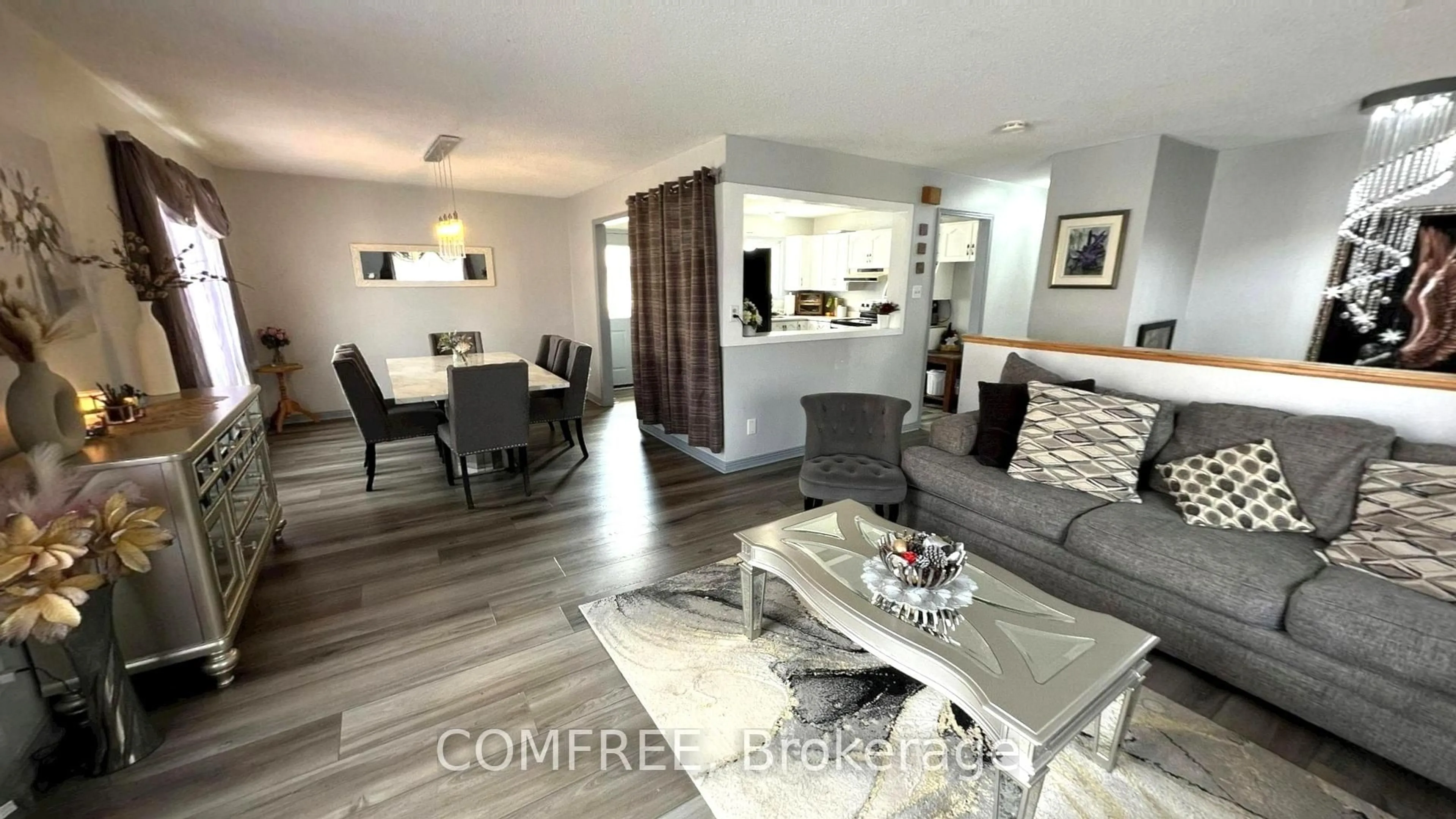 Living room with furniture, wood/laminate floor for 13 Pearl St, Smiths Falls Ontario K7A 5G2