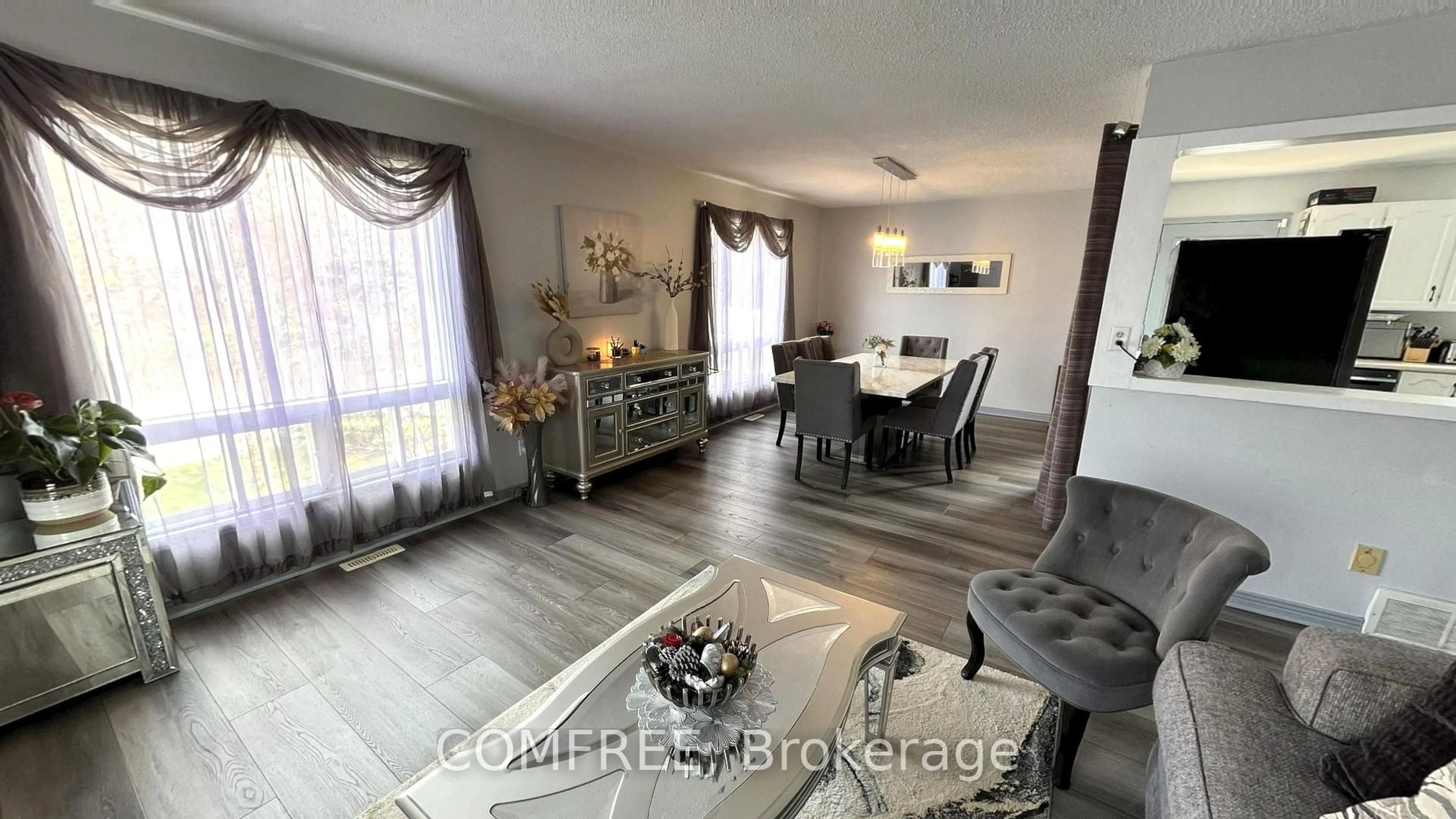 Living room with furniture, wood/laminate floor for 13 Pearl St, Smiths Falls Ontario K7A 5G2