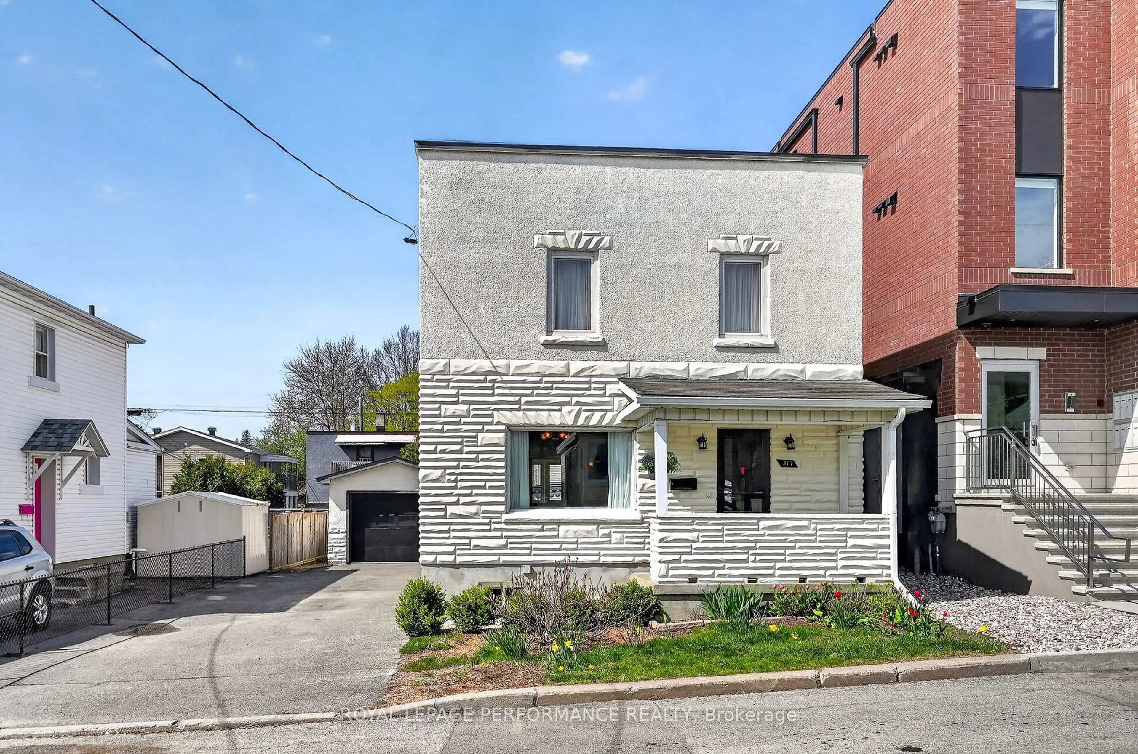 Home with brick exterior material, street for 317 Shakespeare St, Ottawa Ontario K1L 5M1
