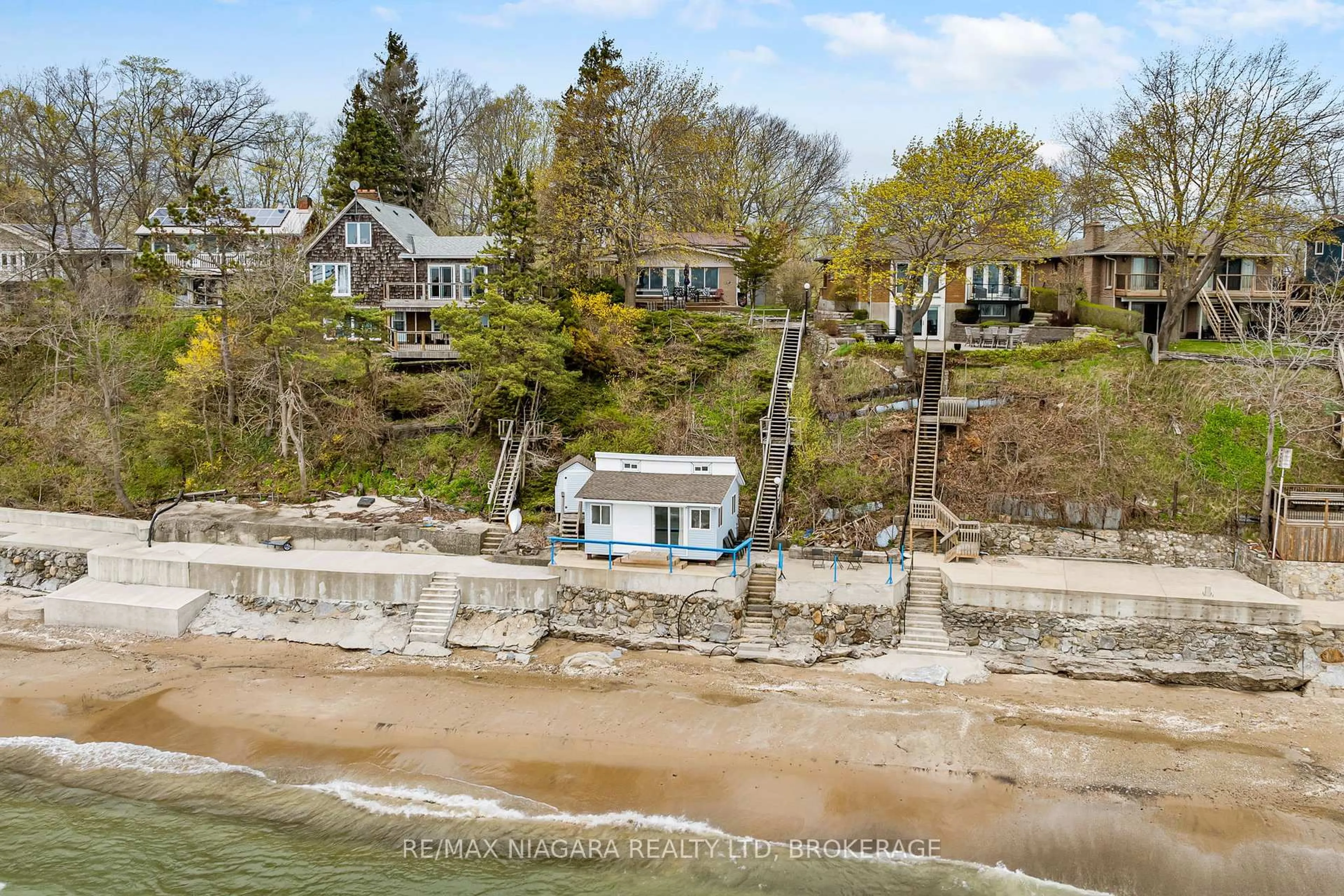 A pic from outside/outdoor area/front of a property/back of a property/a pic from drone, water/lake/river/ocean view for 10419 Lakeshore Rd, Wainfleet Ontario L3K 5V4