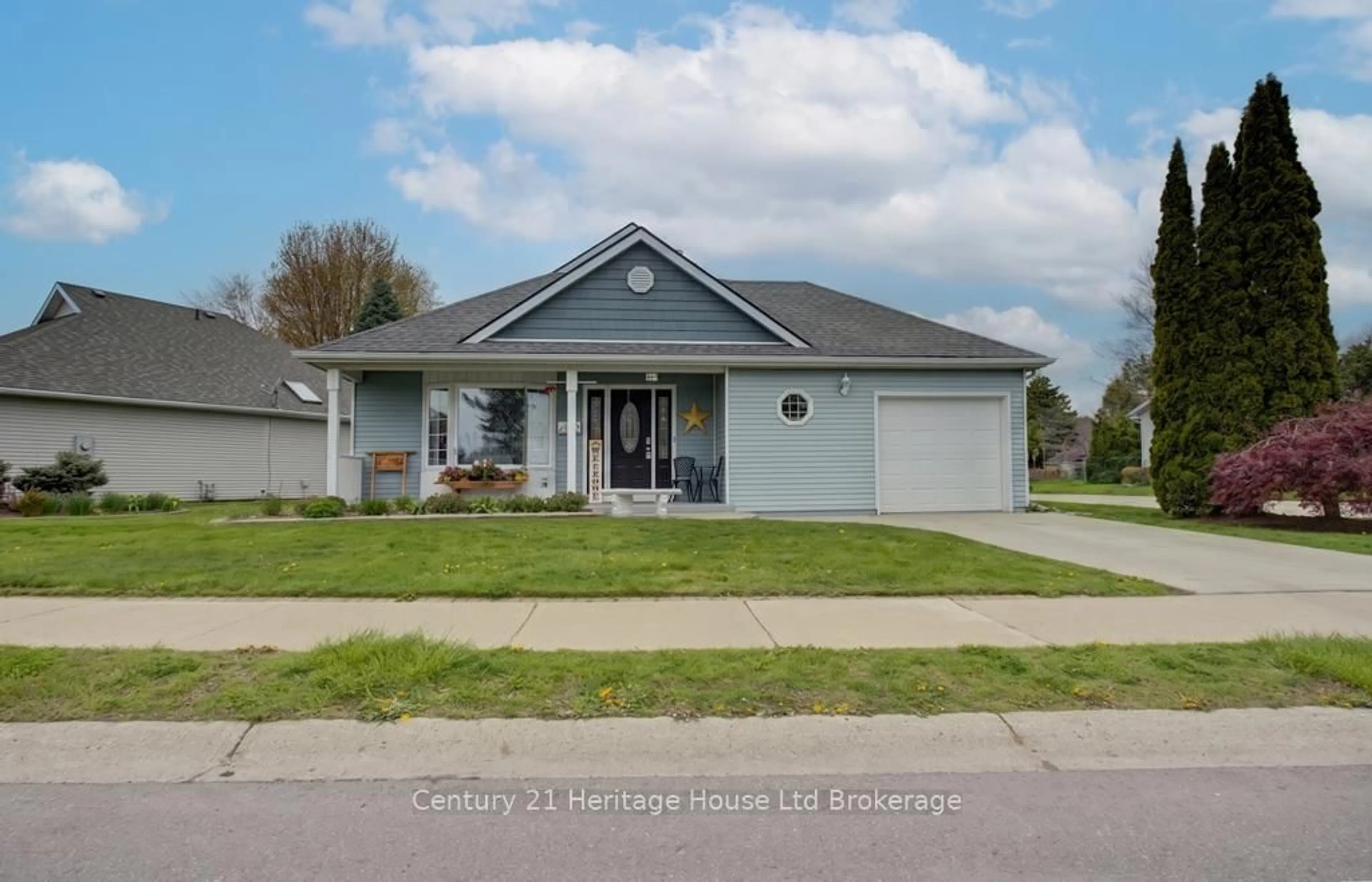 Home with vinyl exterior material, street for 5 Dereham Dr, Tillsonburg Ontario N4G 5L8