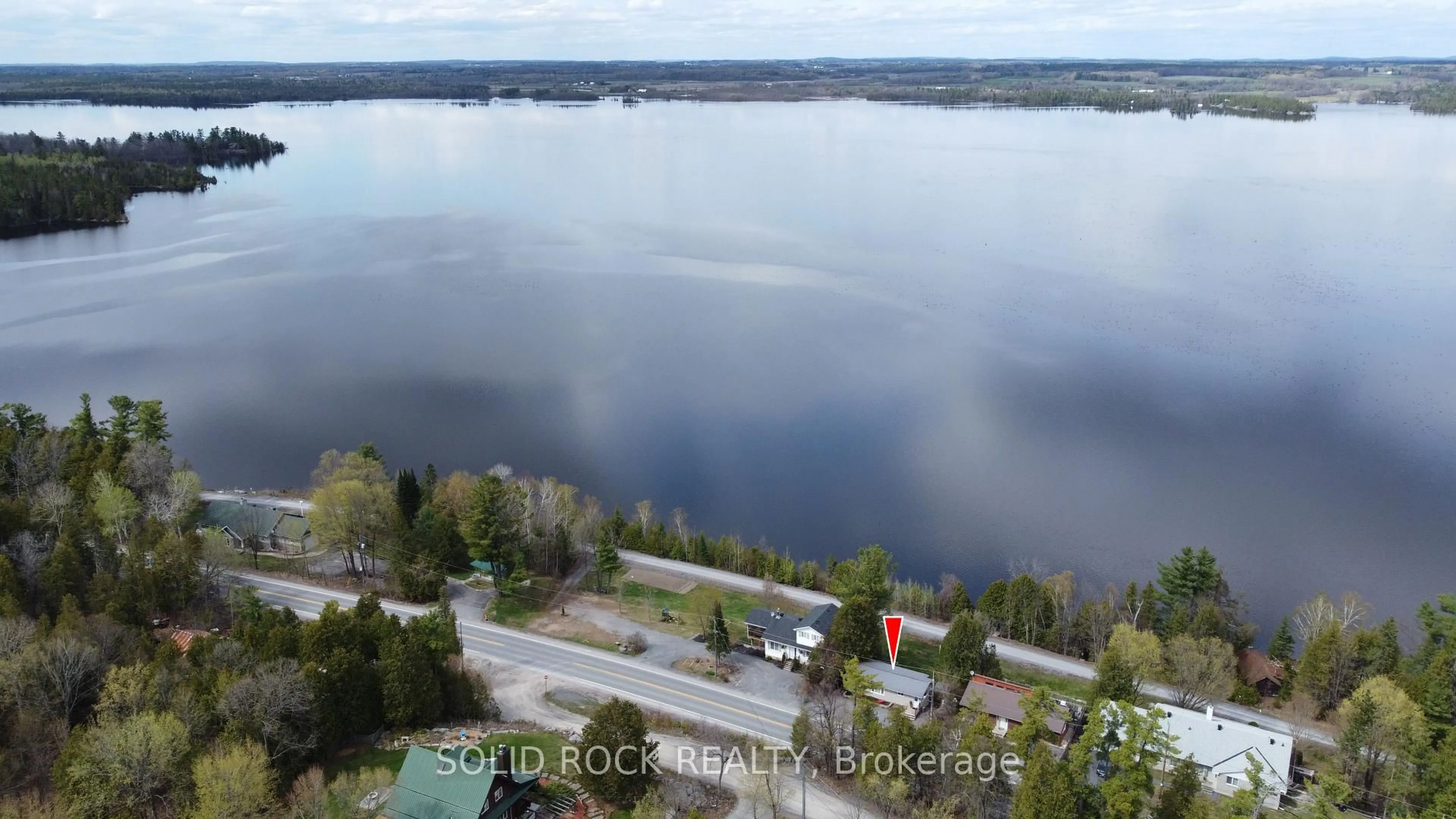 A pic from outside/outdoor area/front of a property/back of a property/a pic from drone, water/lake/river/ocean view for 2496 River Rd, Braeside Ontario K0A 1G0