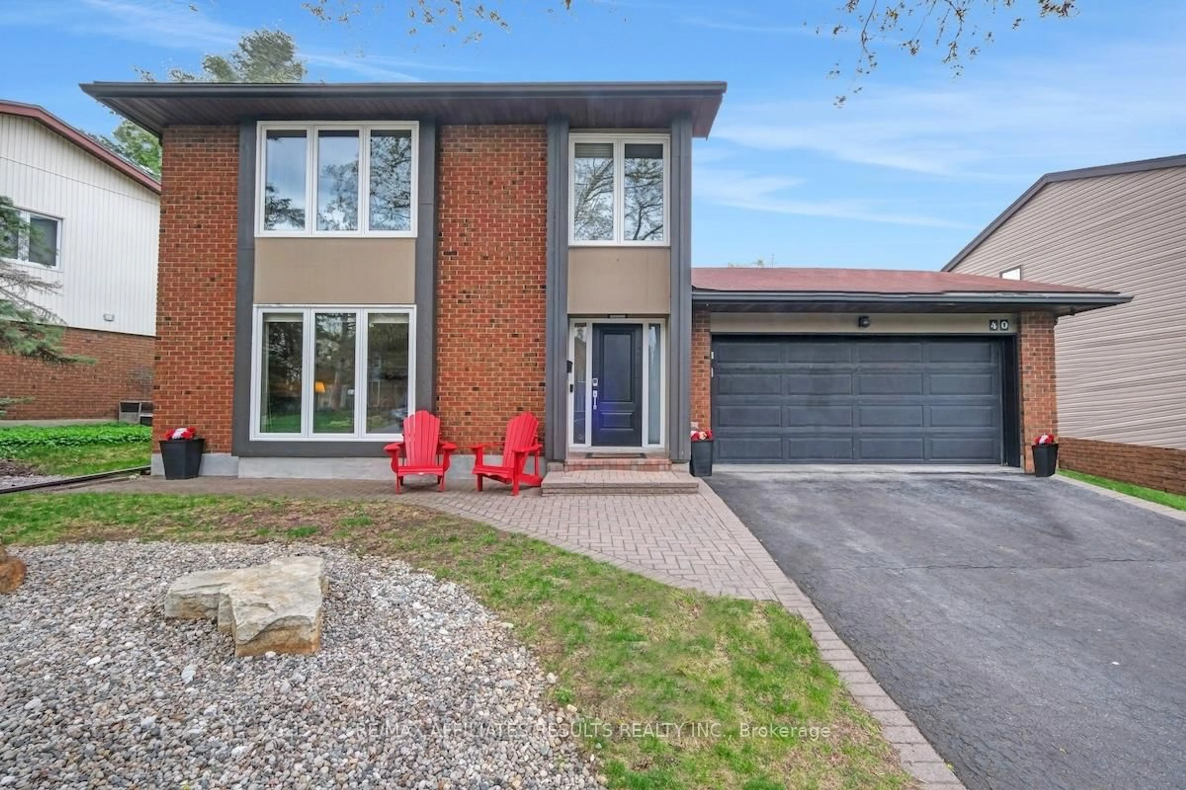 Home with brick exterior material, street for 40 Nanook Cres, Kanata Ontario K2L 2A7