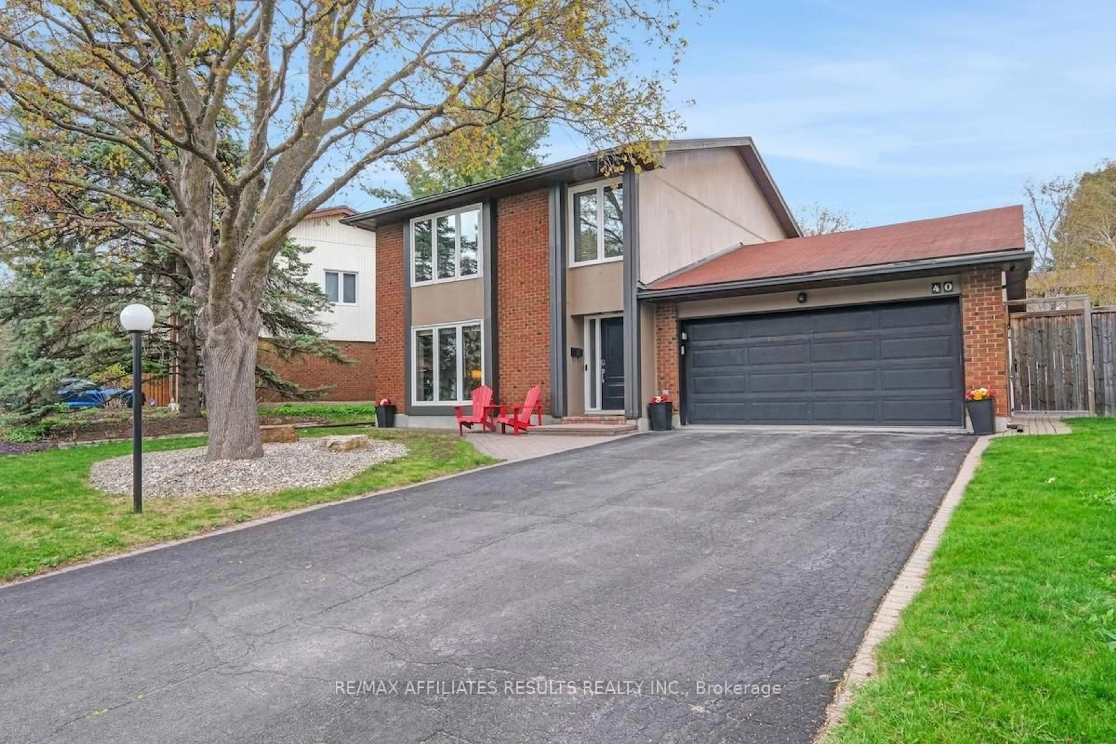 Home with brick exterior material, street for 40 Nanook Cres, Kanata Ontario K2L 2A7