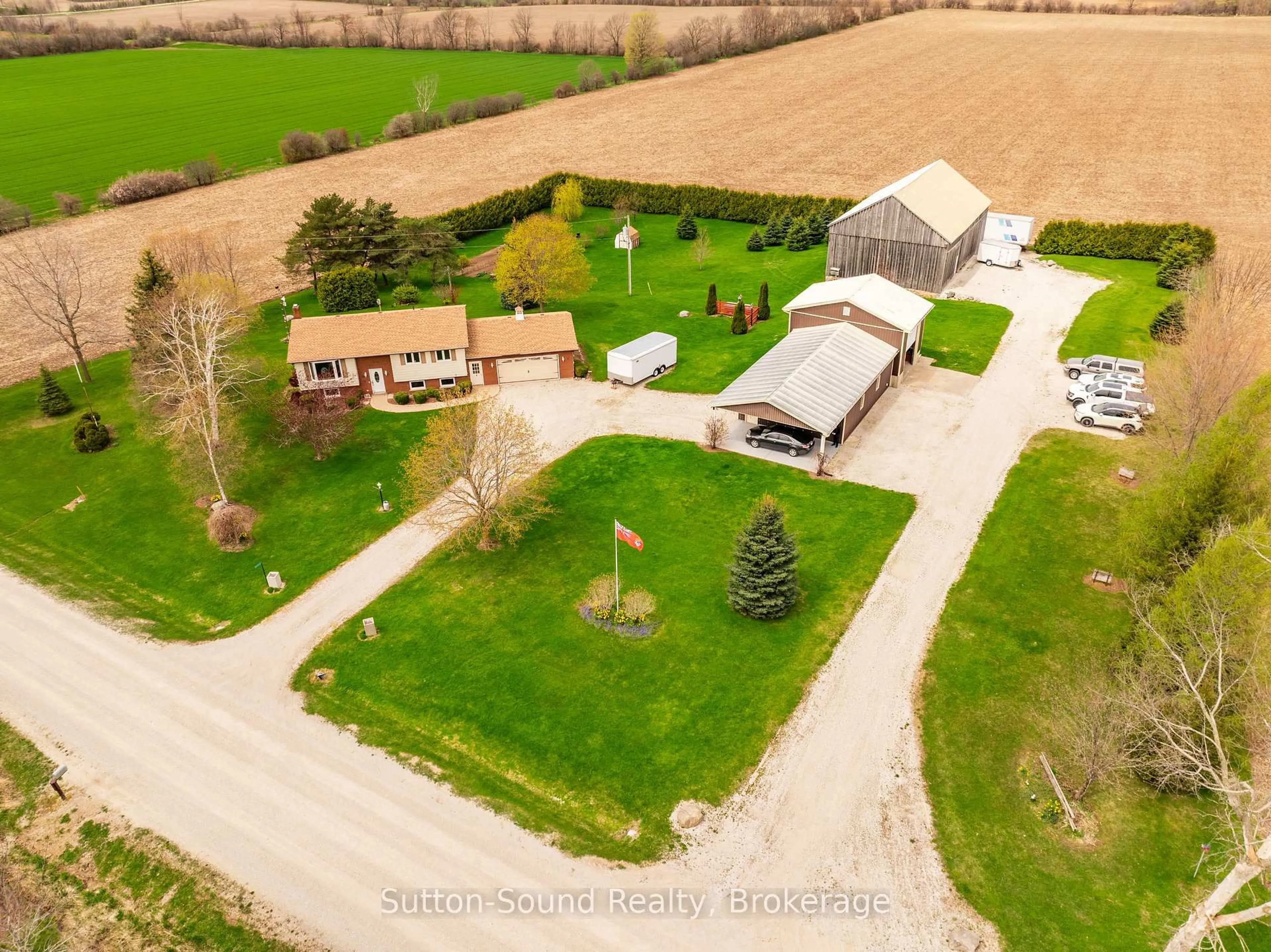 A pic from outside/outdoor area/front of a property/back of a property/a pic from drone, street for 244363 22 Sdrd, Meaford Ontario N4K 5W4