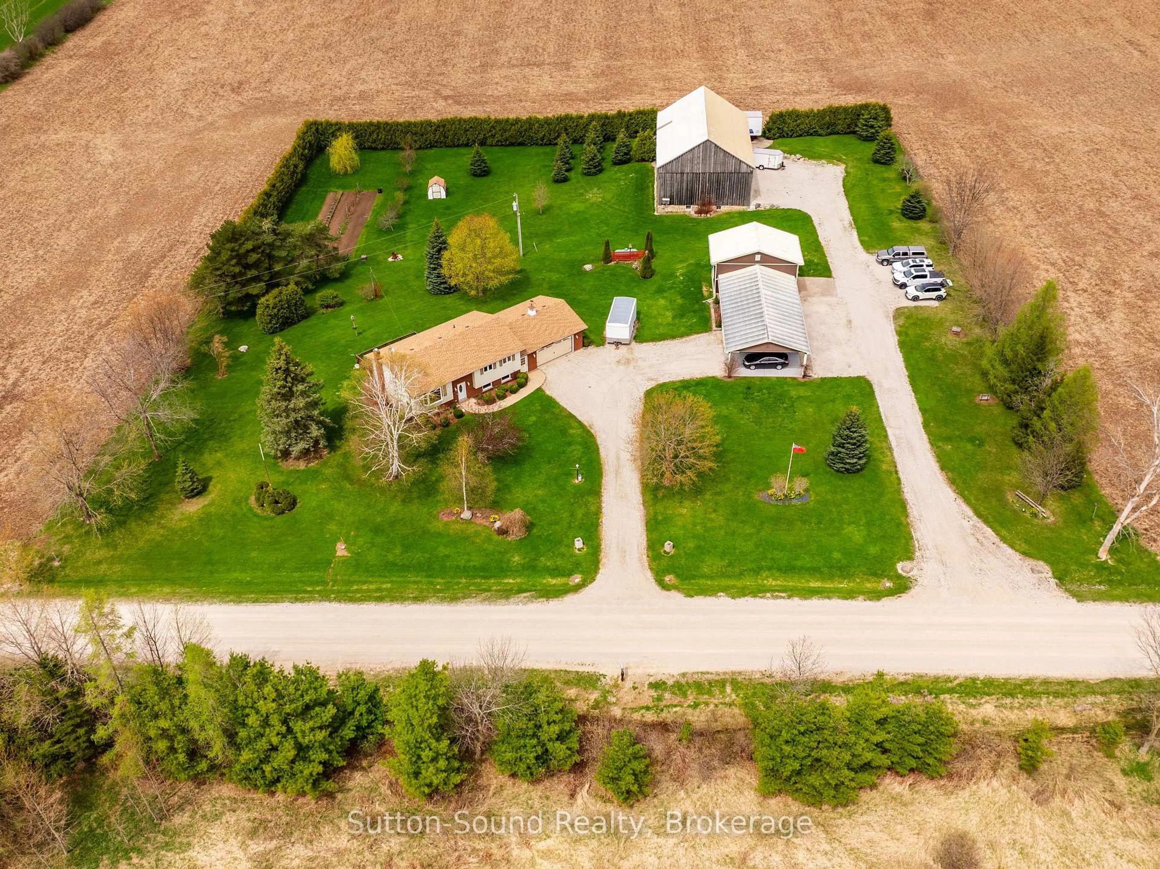 A pic from outside/outdoor area/front of a property/back of a property/a pic from drone, unknown for 244363 22 Sdrd, Meaford Ontario N4K 5W4