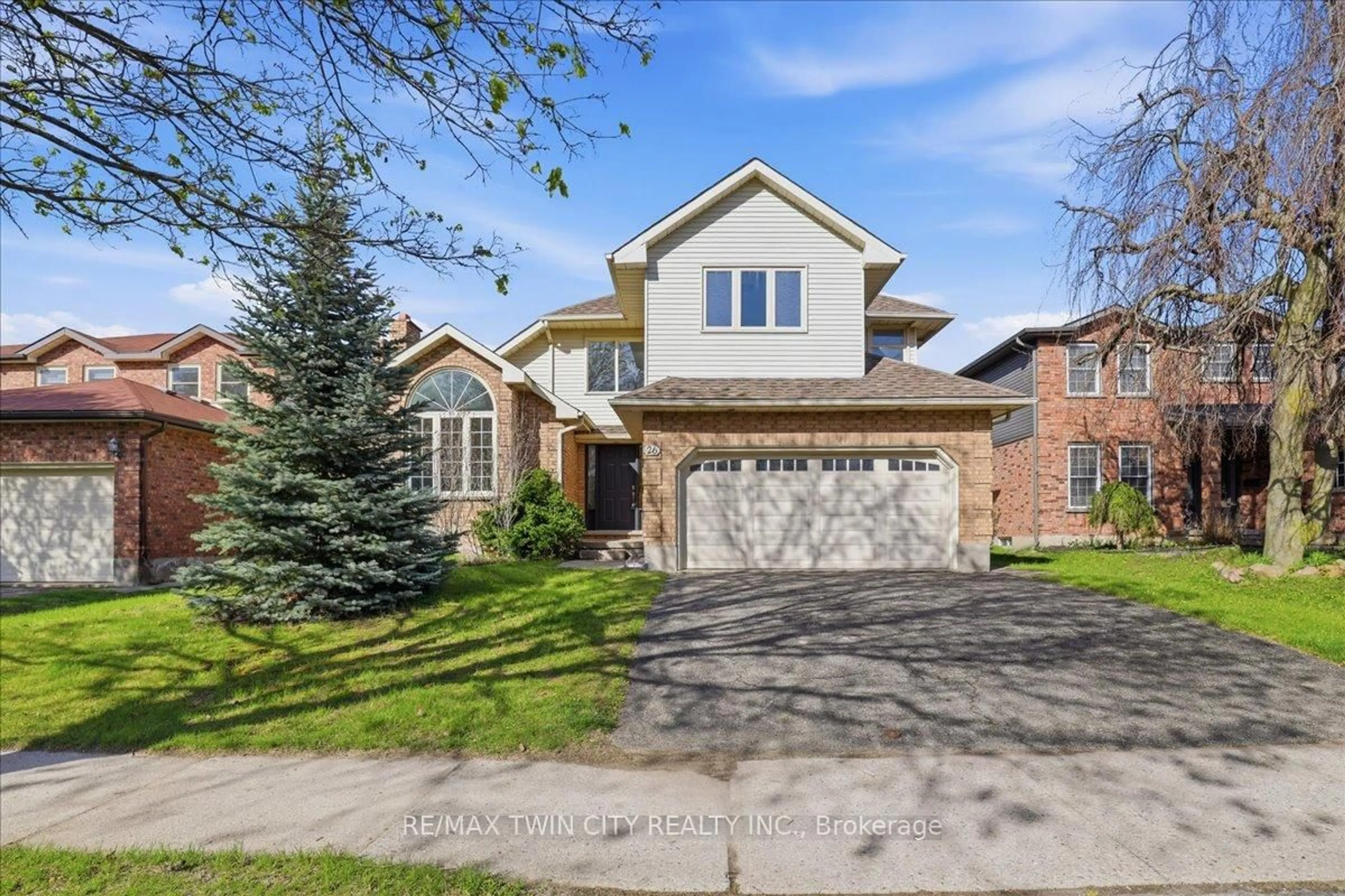 Home with brick exterior material, street for 26 Robertson Cres, Kitchener Ontario N2R 1E3