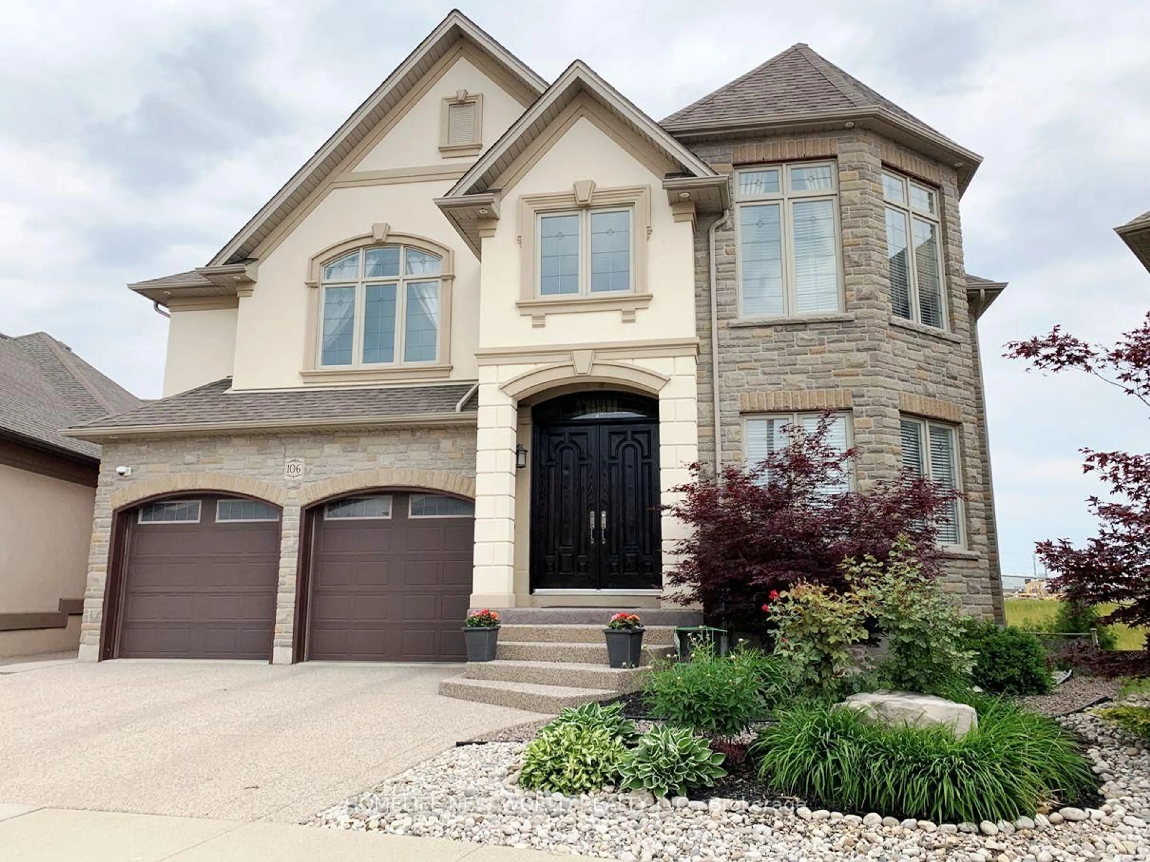 Home with brick exterior material, street for 106 Paige St, Kitchener Ontario N2K 4P6