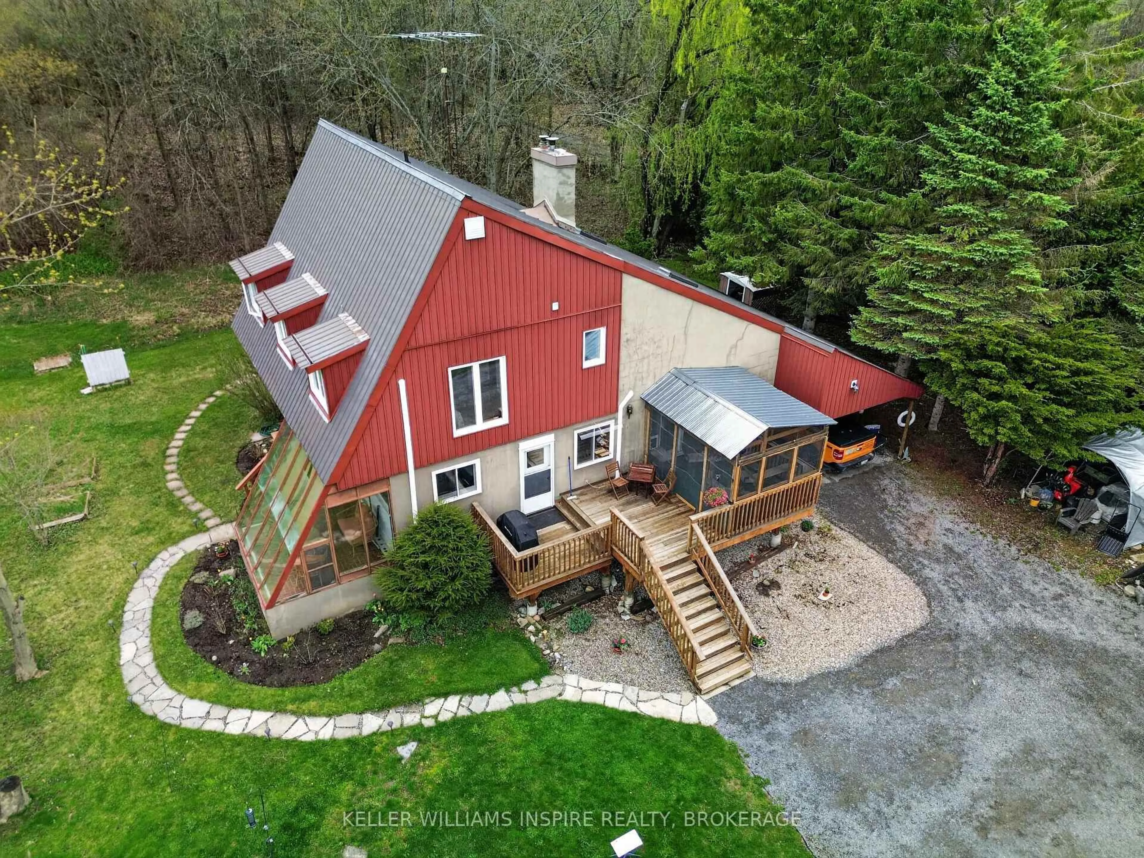 A pic from outside/outdoor area/front of a property/back of a property/a pic from drone, unknown for 26 Howe Island Ferry Rd, Kingston Ontario K7L 4V1