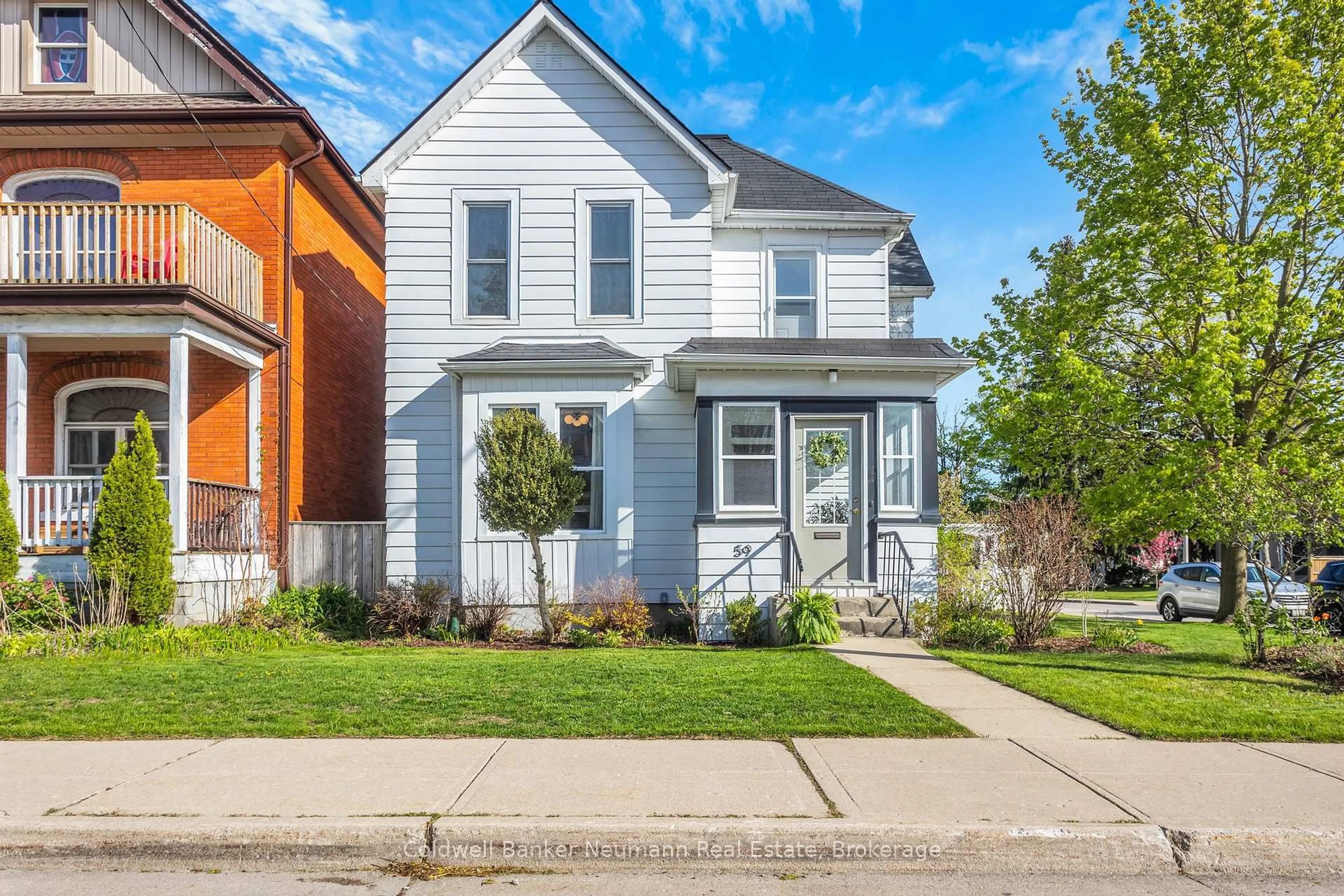 Home with brick exterior material, street for 59 Washington Grand Ave, Tillsonburg Ontario N4G 1Y8