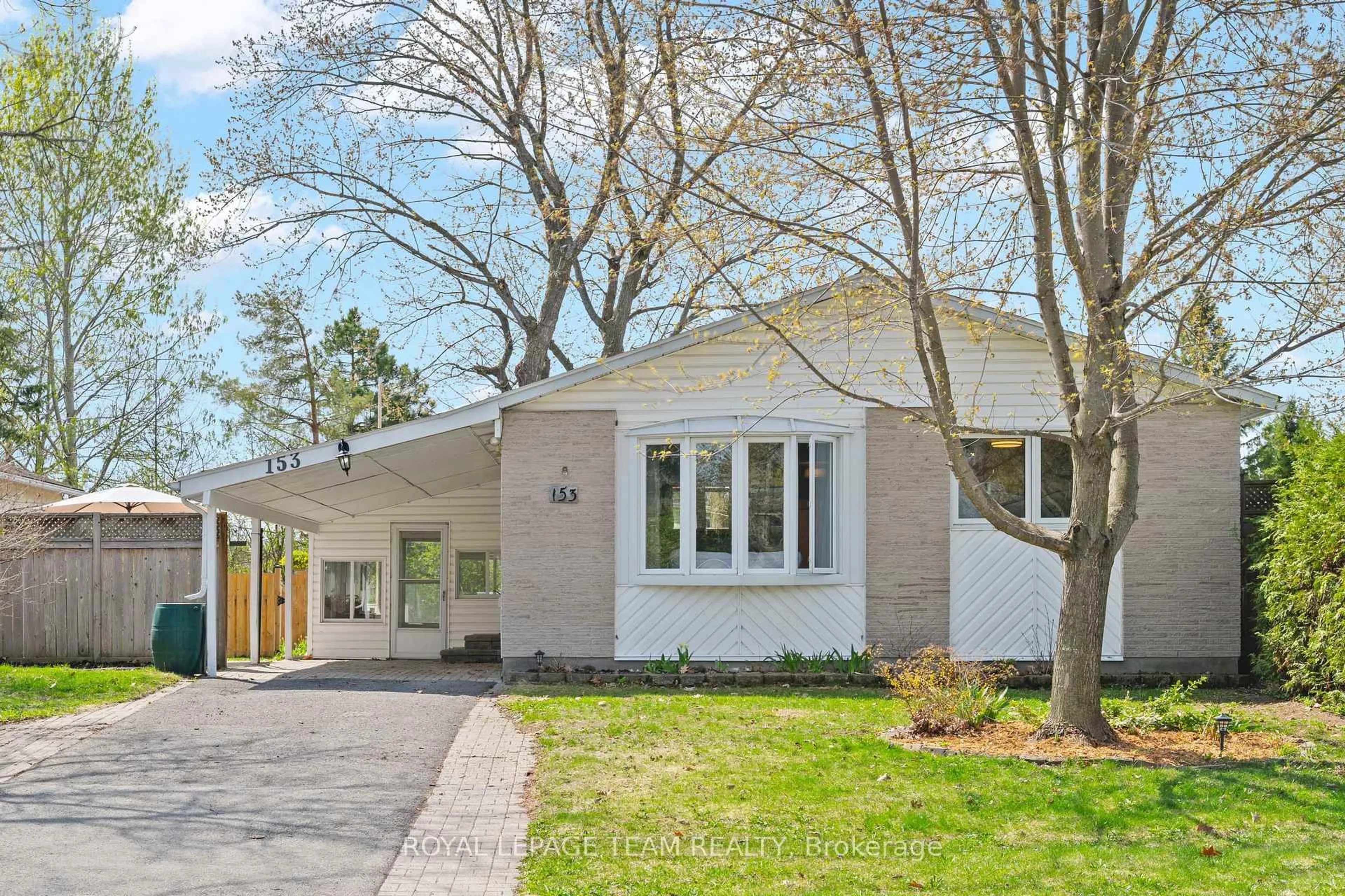 Home with brick exterior material, street for 153 Post Rd, Ottawa Ontario K2L 1L1