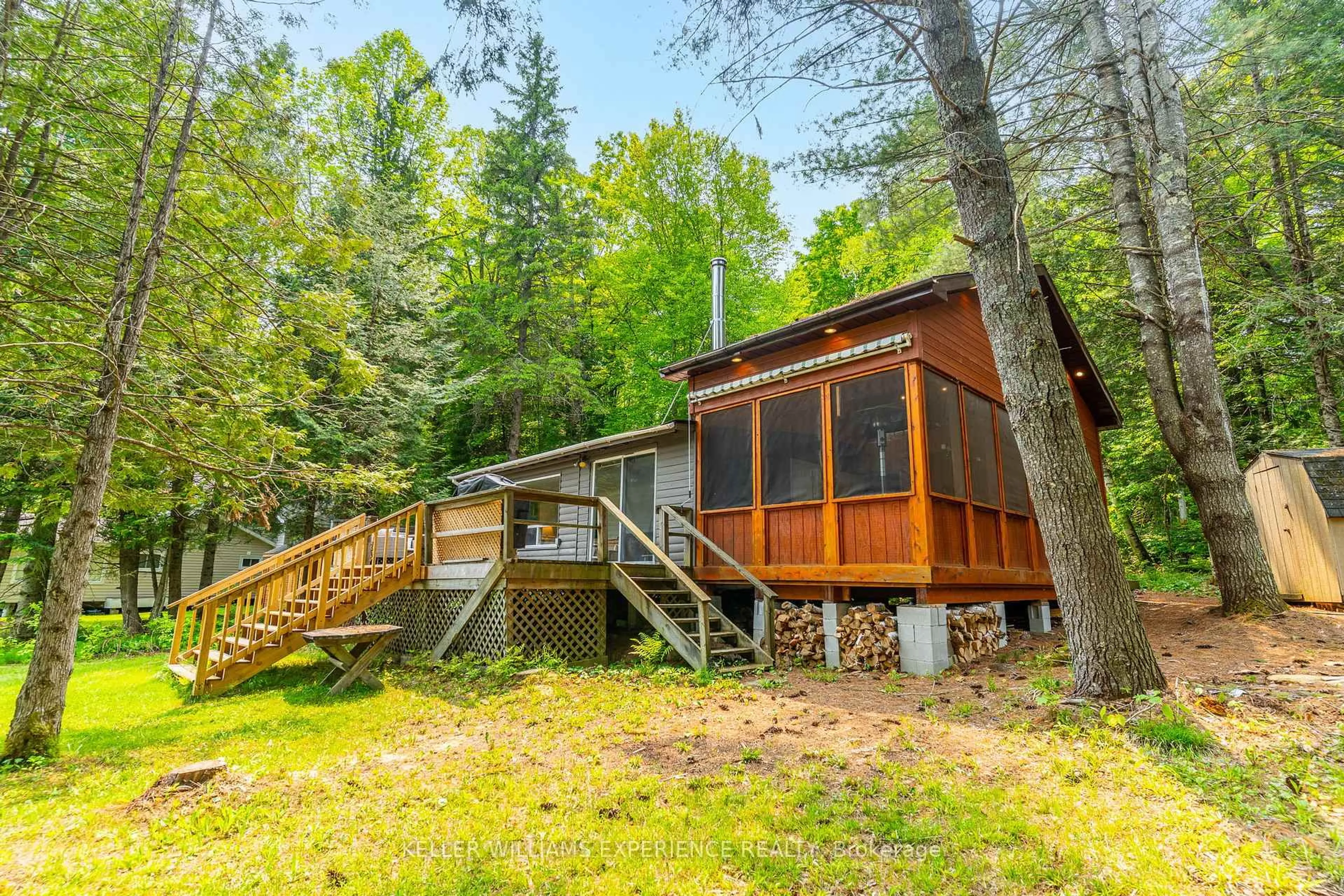 Patio, forest/trees view for 1049 Elsie Bay Dr, Minden Hills Ontario K0M 2K0