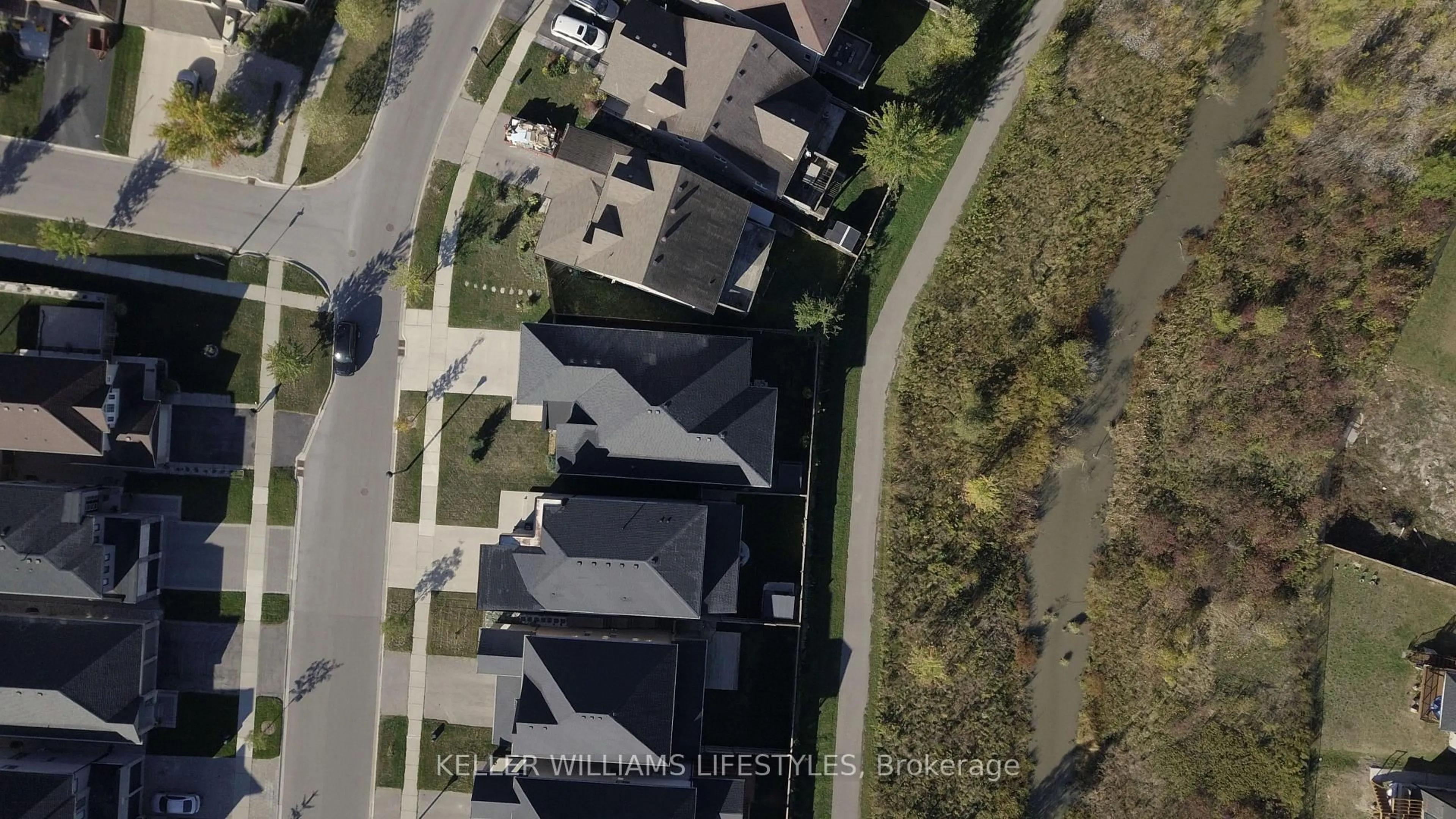A pic from outside/outdoor area/front of a property/back of a property/a pic from drone, street for 1934 Wateroak Dr, London North Ontario N6G 0M7