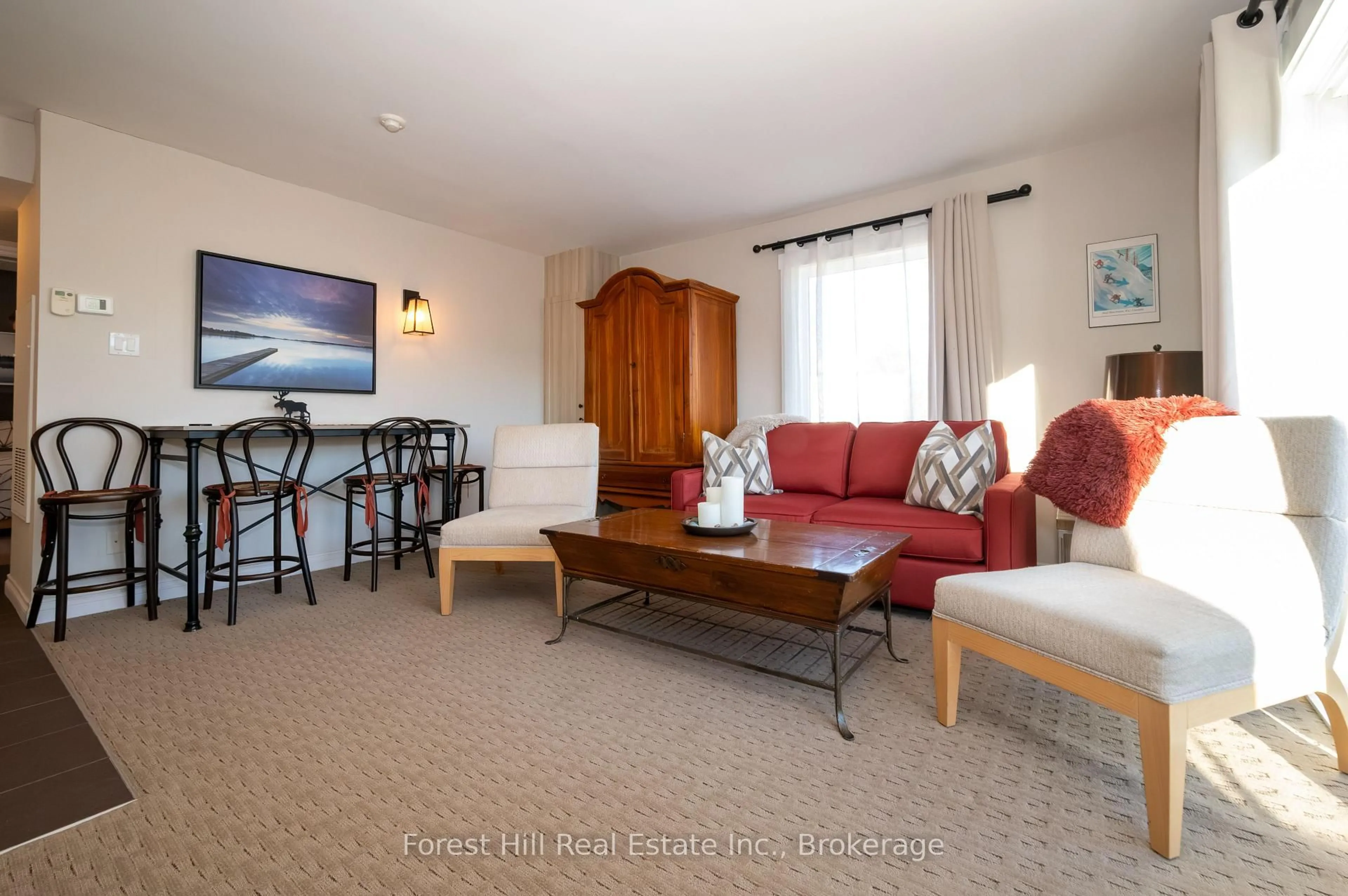 Living room with furniture, unknown for 1235 Deerhurst Dr #303, Huntsville Ontario P1H 2E8