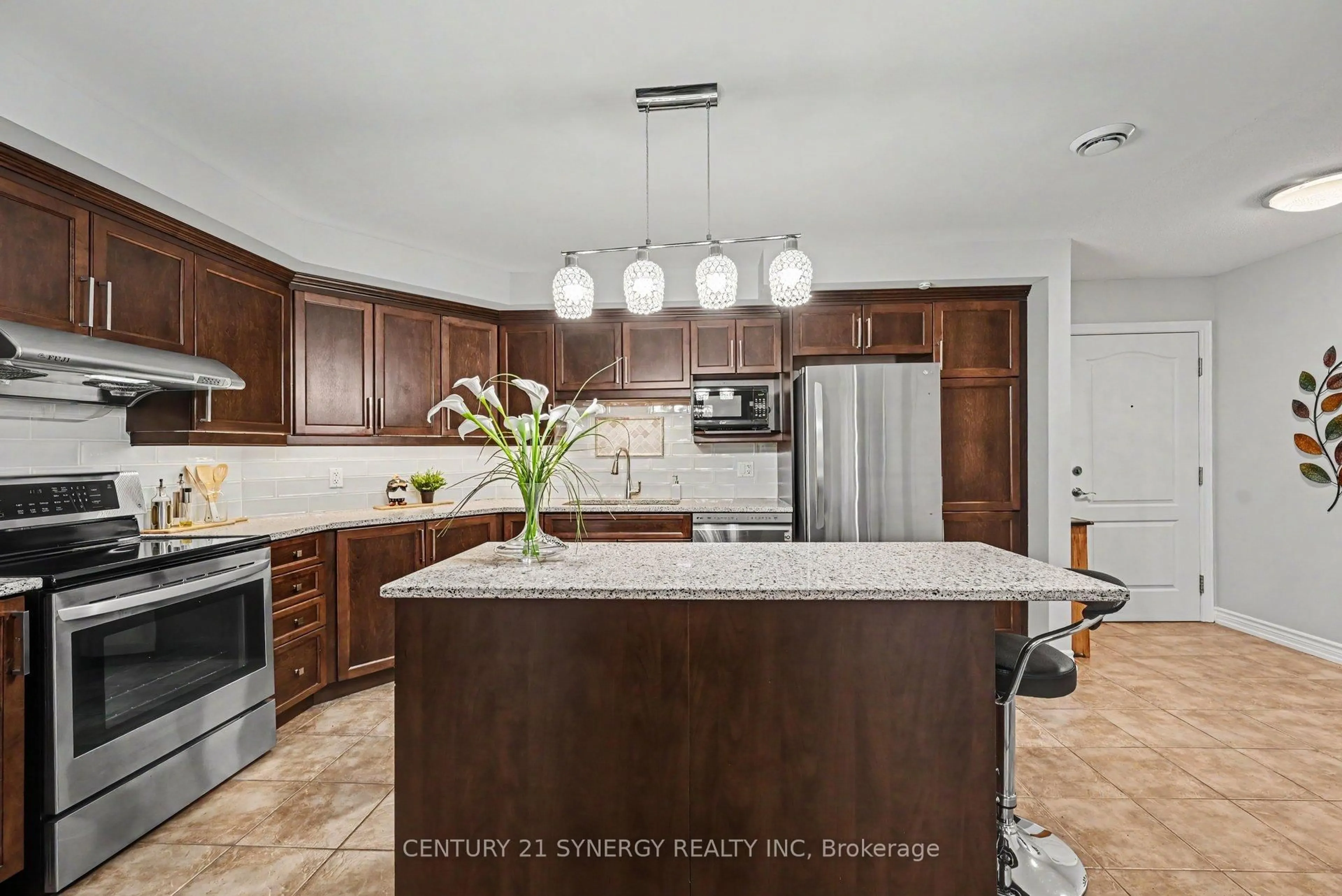 Open concept kitchen, ceramic/tile floor for 770 Principale St #204, Casselman Ontario K0A 1M0