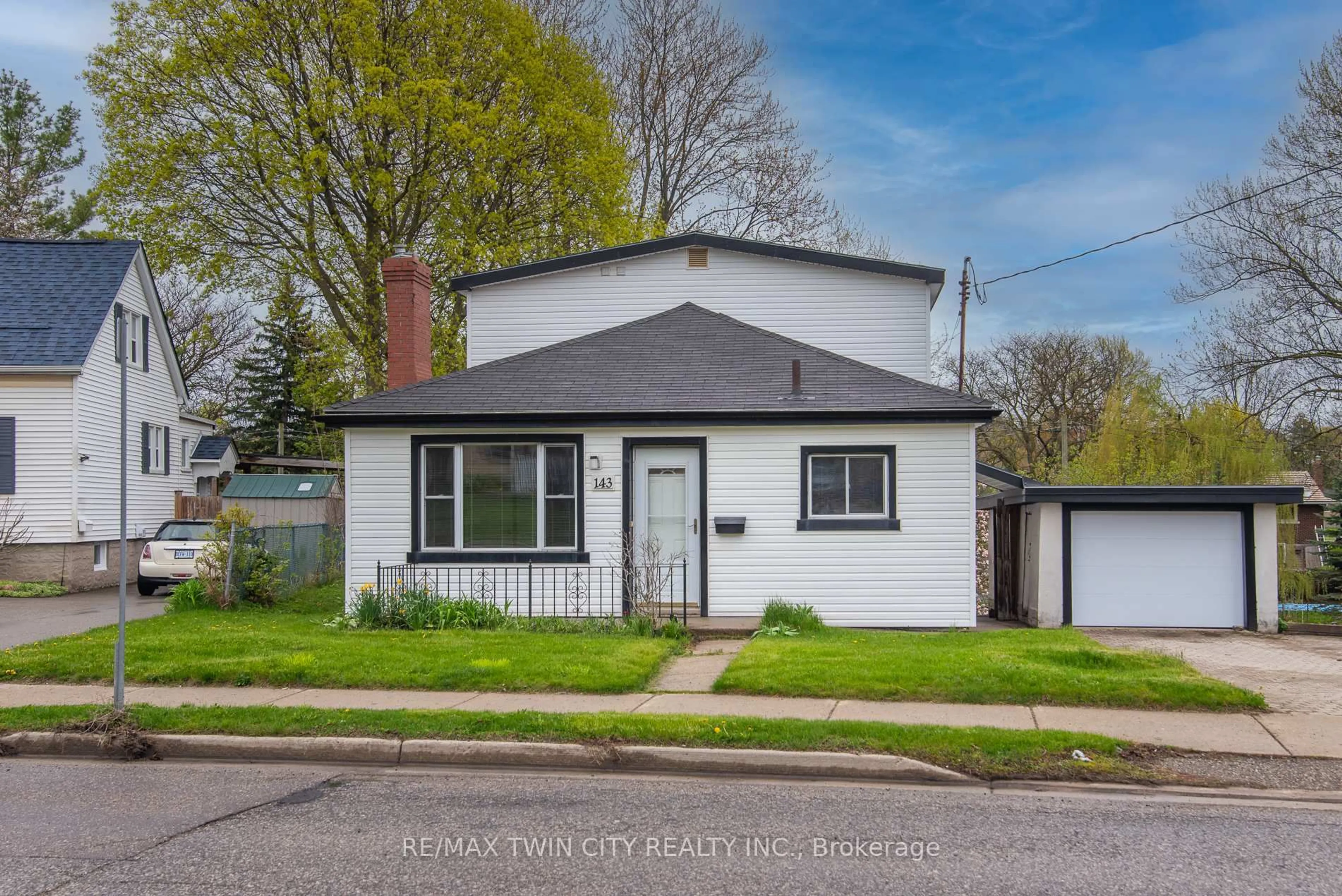 Home with vinyl exterior material, street for 143 Bridgeport Rd, Waterloo Ontario N2J 2K3