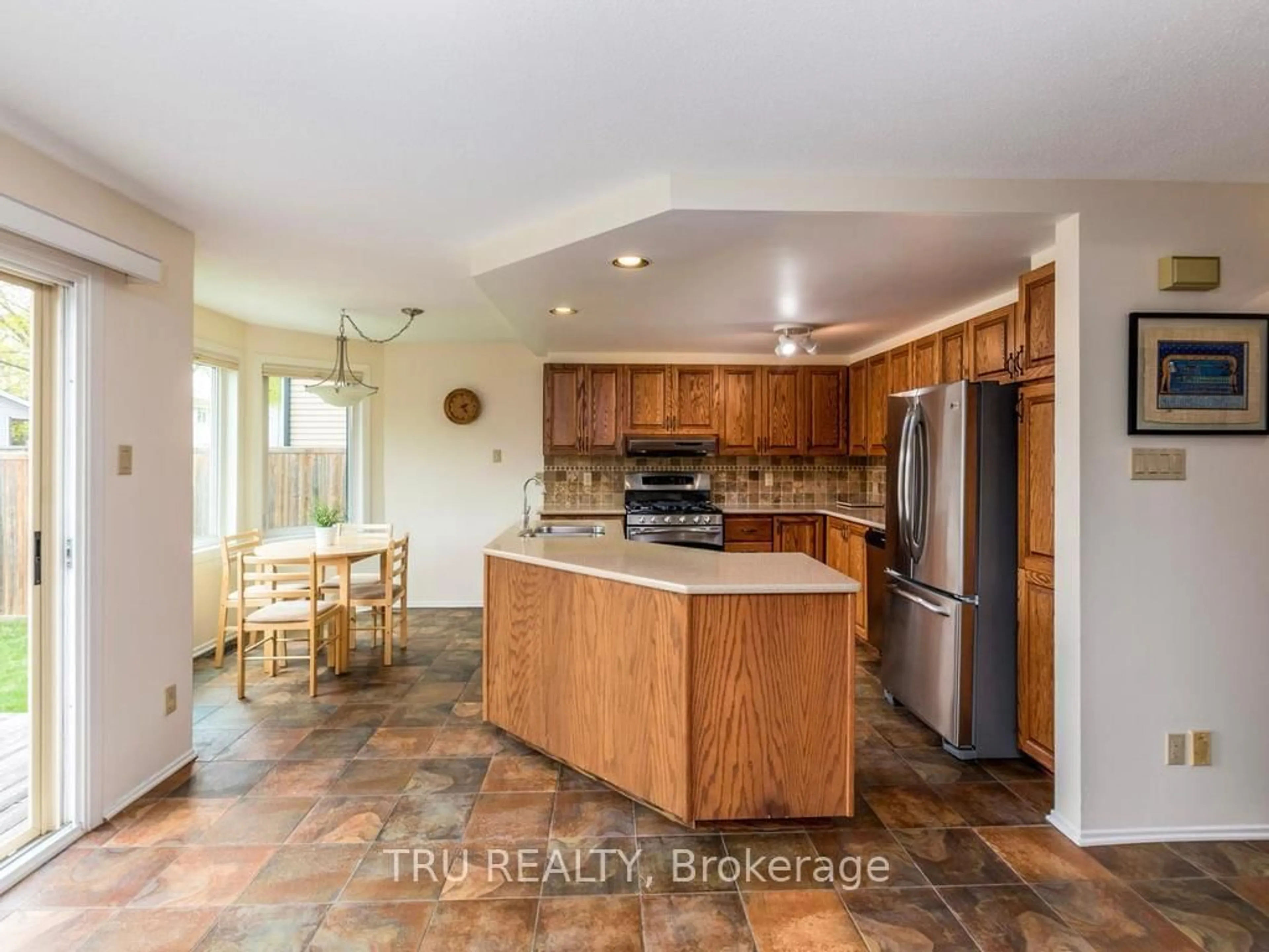 Open concept kitchen, ceramic/tile floor for 14 Hyannis Ave, Ottawa Ontario K2J 2W8