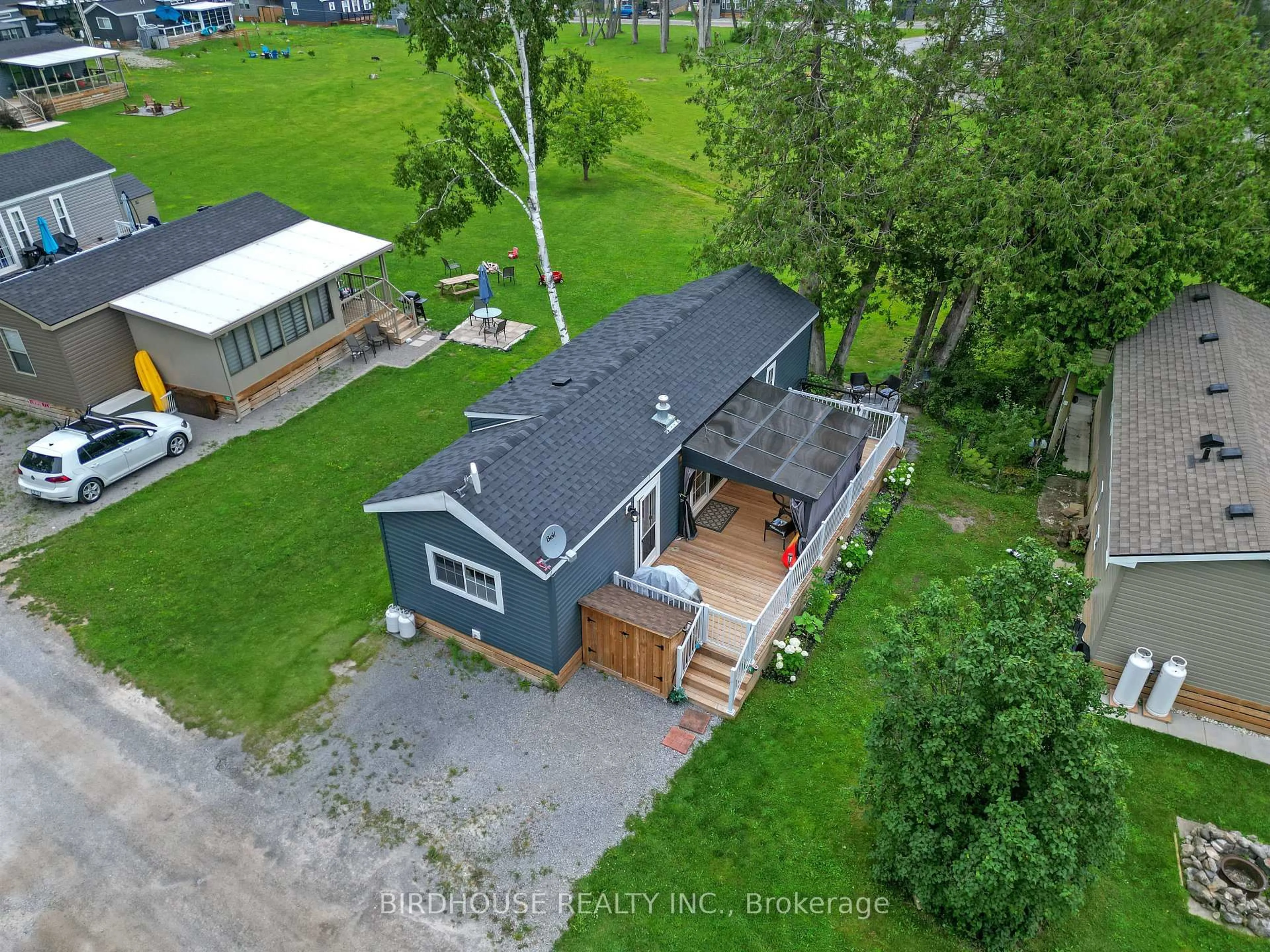 A pic from outside/outdoor area/front of a property/back of a property/a pic from drone, street for 657 Thunderbridge Rd #31, Kawartha Lakes Ontario K9V 4R1