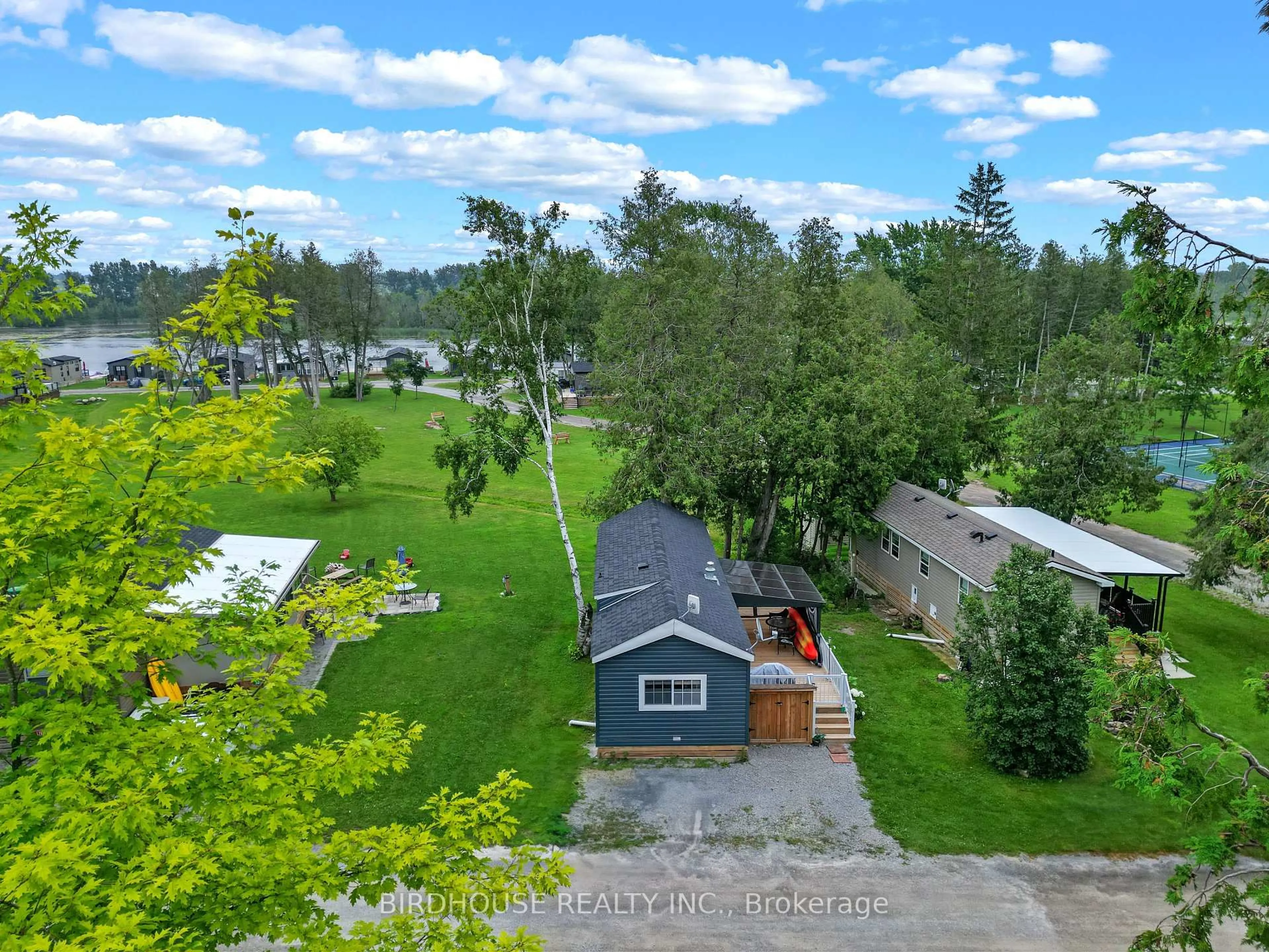 A pic from outside/outdoor area/front of a property/back of a property/a pic from drone, unknown for 657 Thunderbridge Rd #31, Kawartha Lakes Ontario K9V 4R1