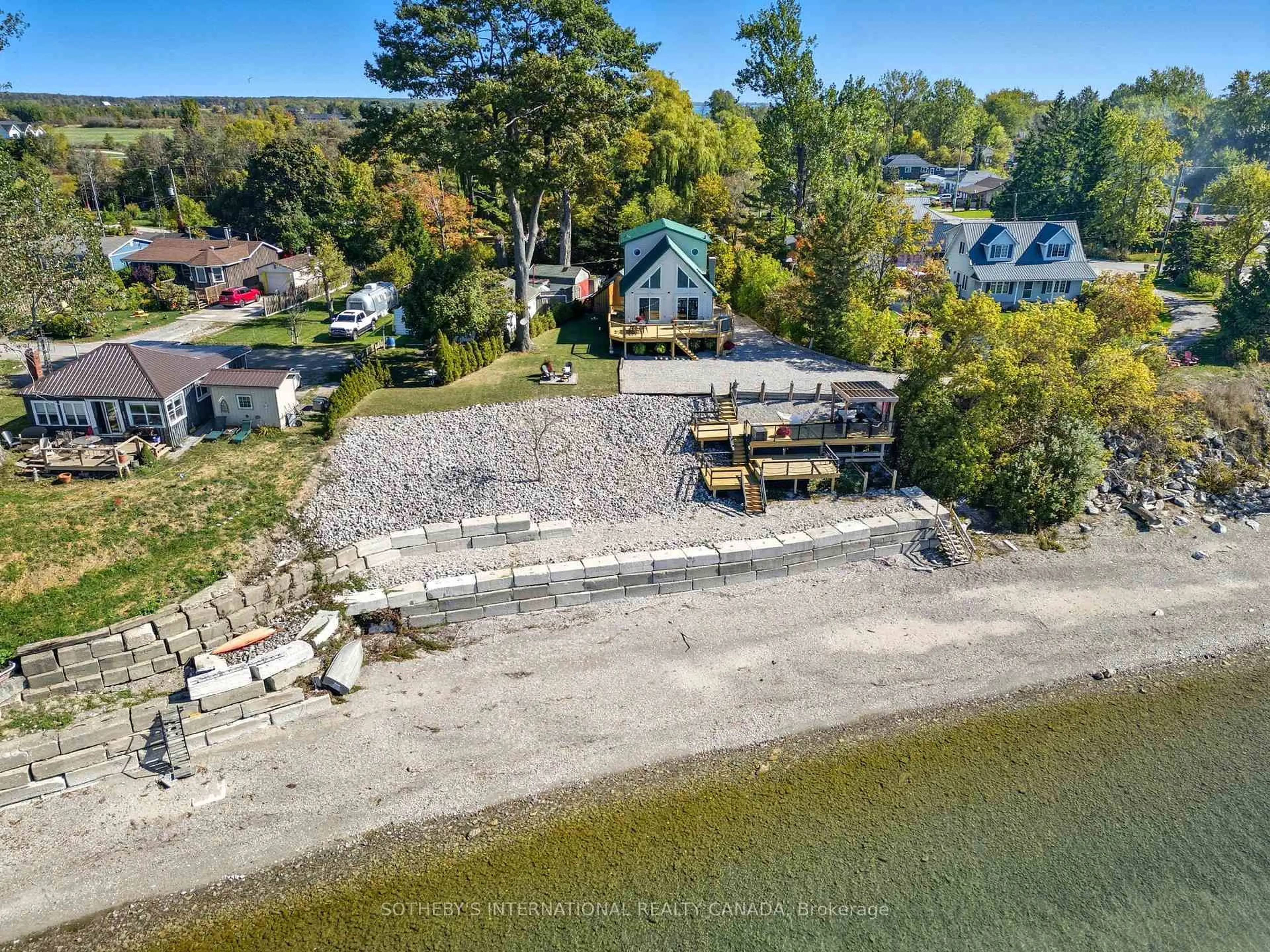 A pic from outside/outdoor area/front of a property/back of a property/a pic from drone, water/lake/river/ocean view for 13 Sunset Dr, Haldimand Ontario N0A 1L0