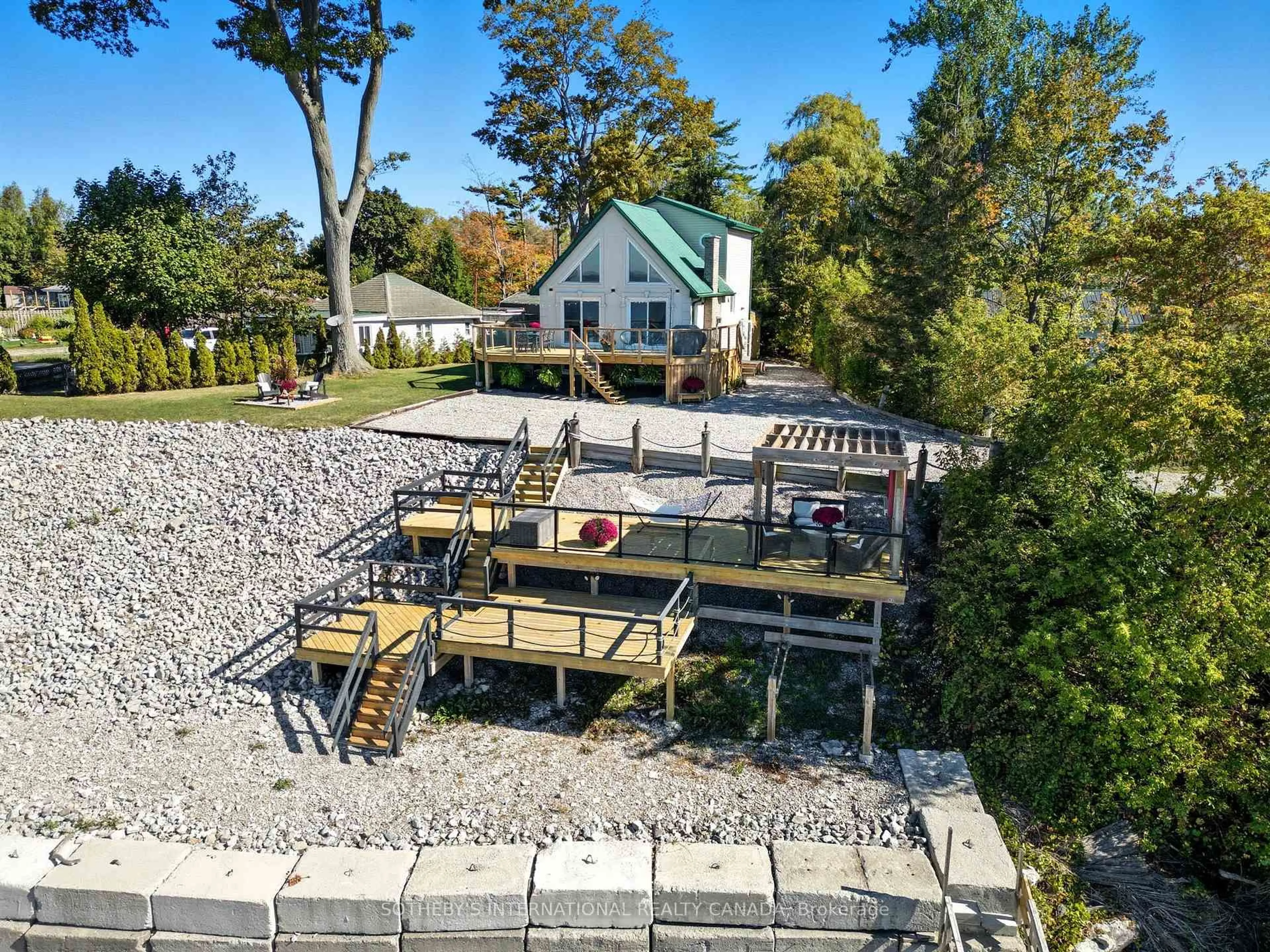 A pic from outside/outdoor area/front of a property/back of a property/a pic from drone, water/lake/river/ocean view for 13 Sunset Dr, Haldimand Ontario N0A 1L0