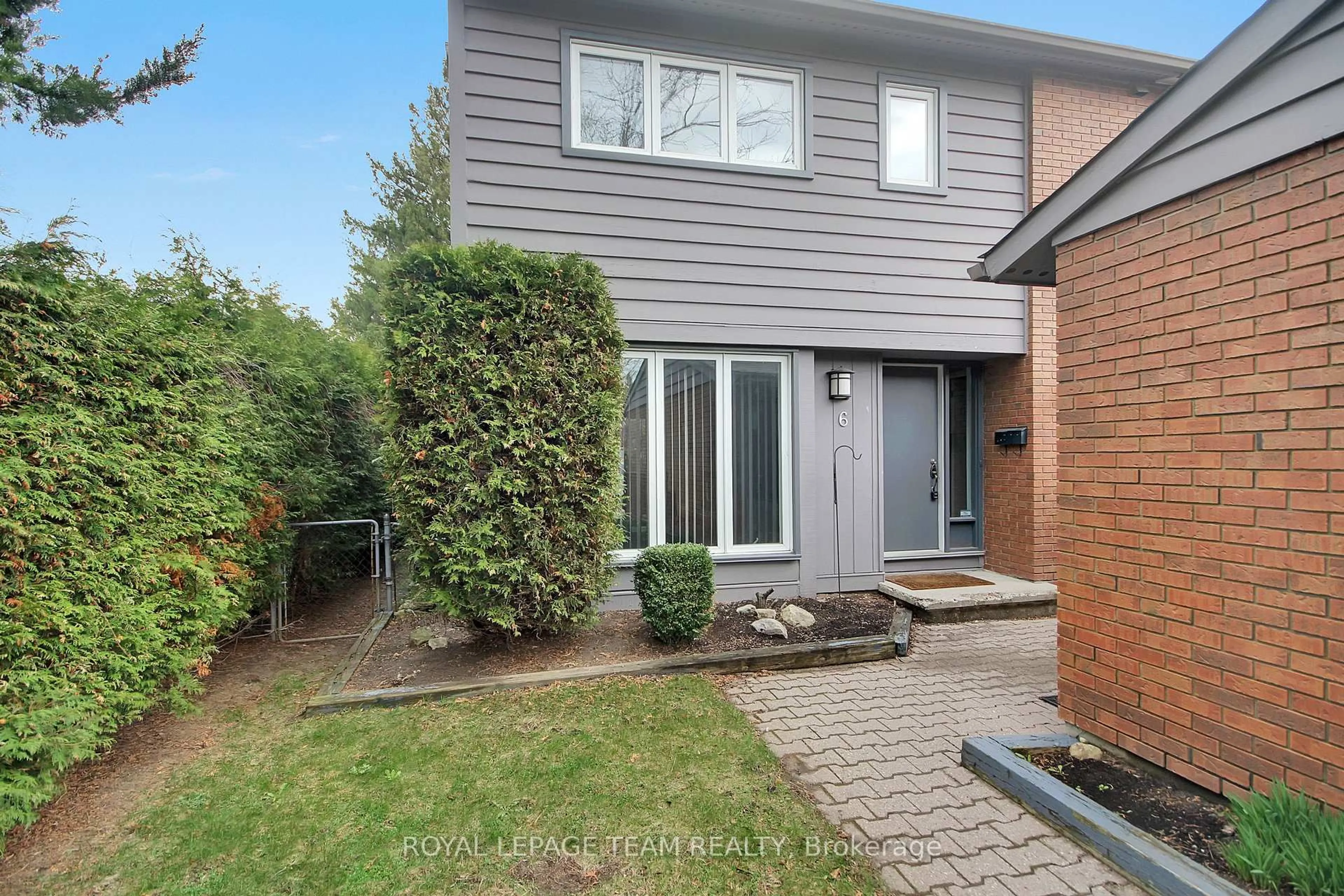 Home with brick exterior material, street for 6 BURNETTS GROVE Circ, Ottawa Ontario K2J 1N6