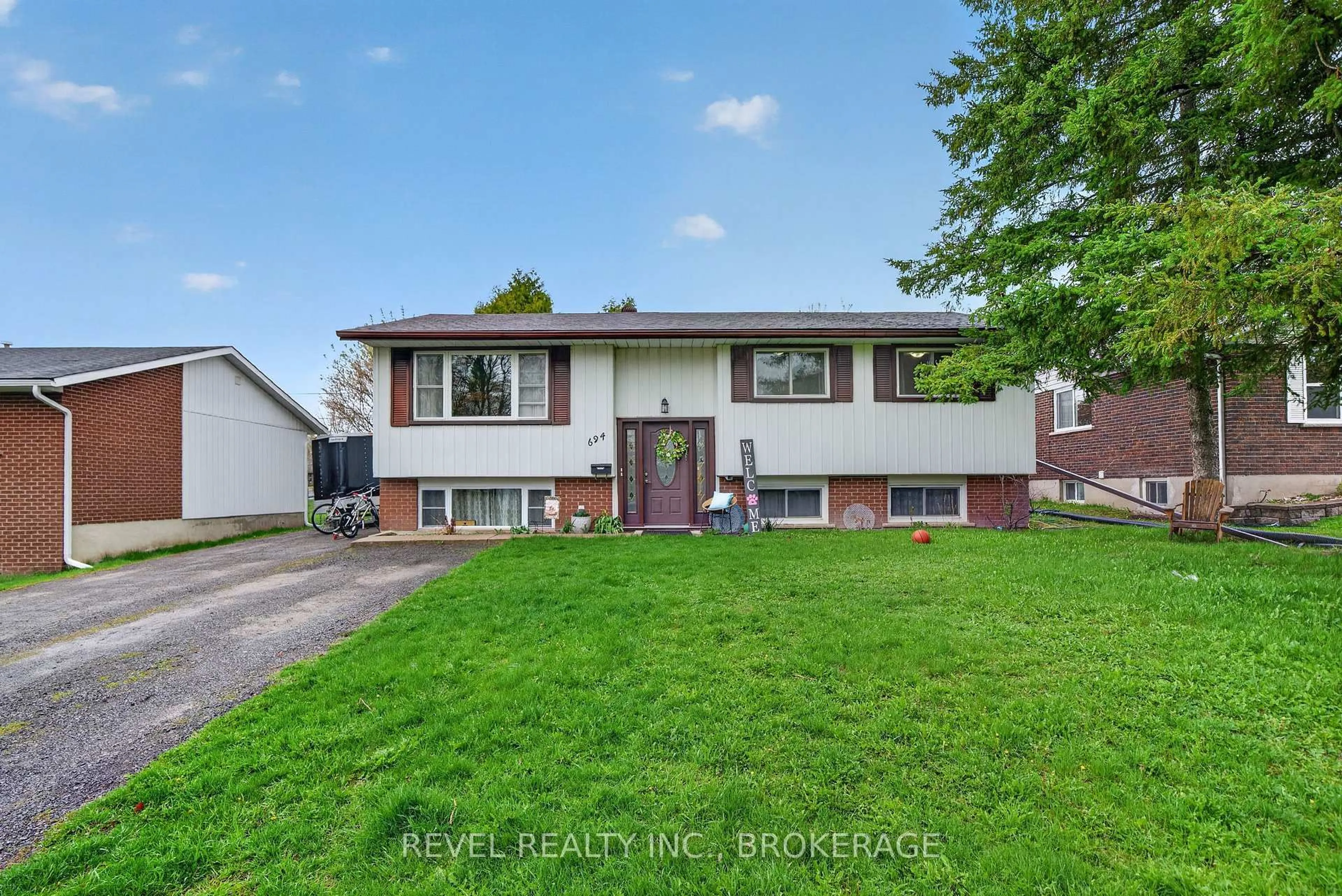 Home with vinyl exterior material, street for 694 High Gate Park Dr, Kingston Ontario K7M 5Z9