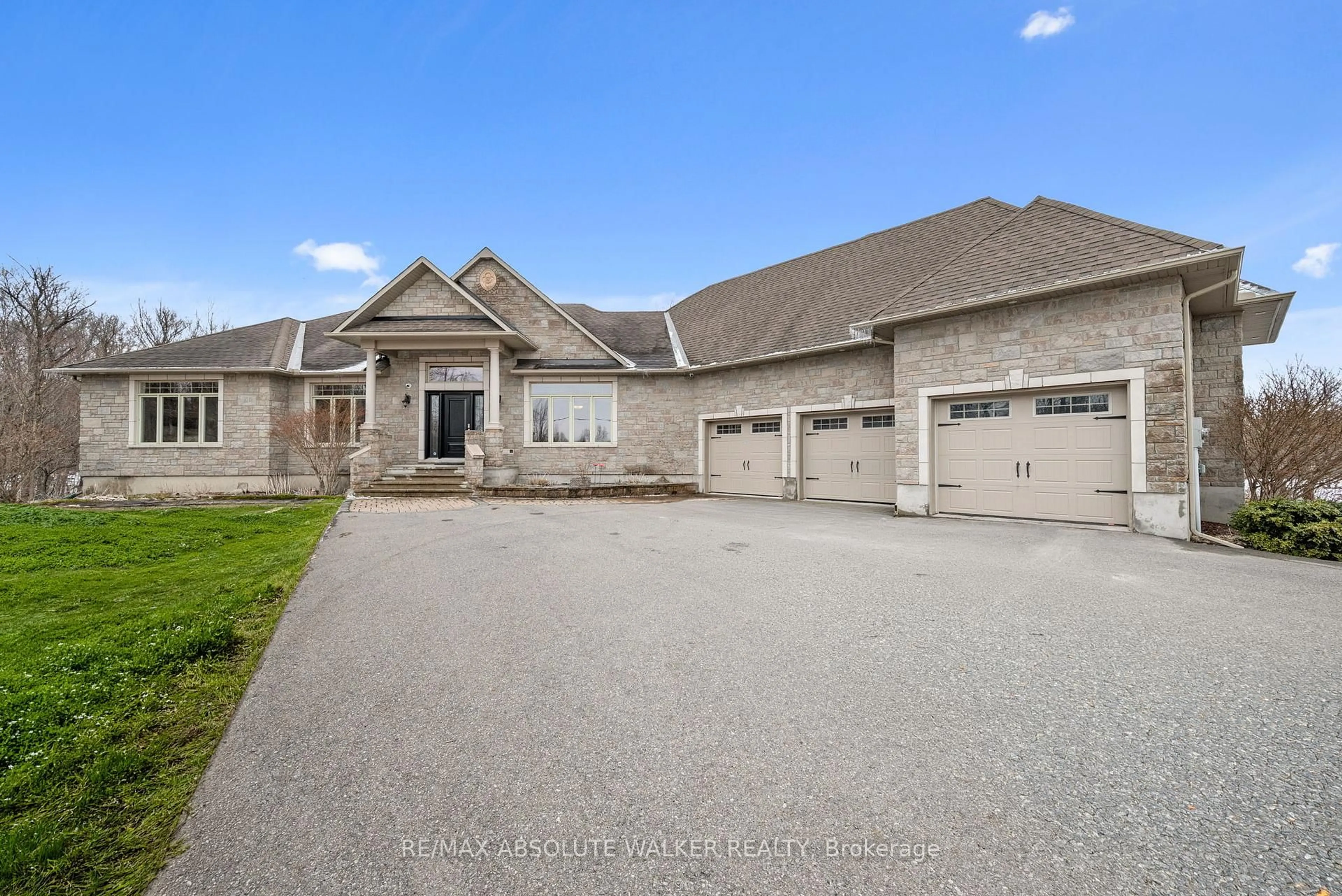 A pic from outside/outdoor area/front of a property/back of a property/a pic from drone, street for 8134 Adam Baker Way, Metcalfe Ontario K0A 2P0
