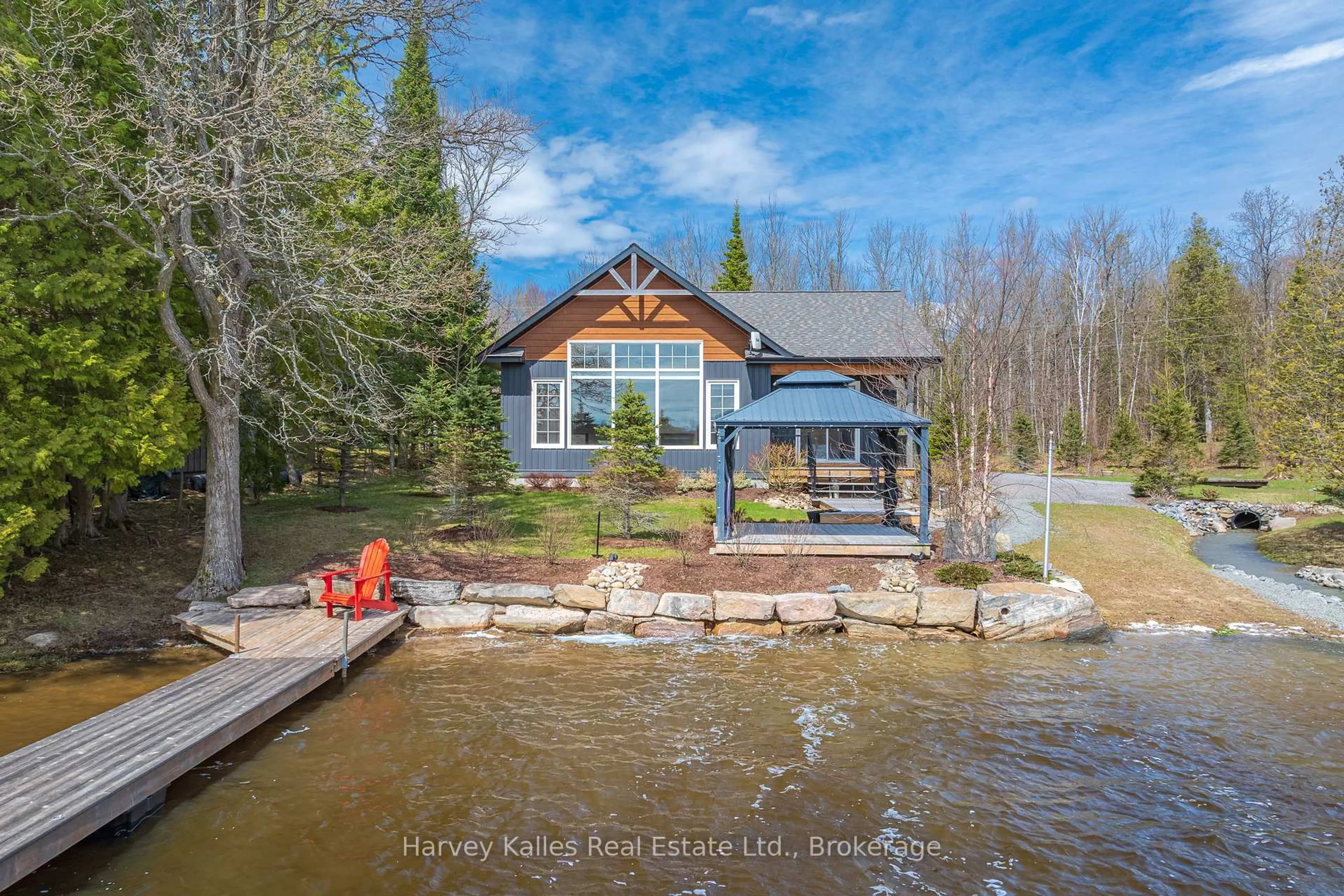 A pic from outside/outdoor area/front of a property/back of a property/a pic from drone, water/lake/river/ocean view for 41 Sunset Cove Rd, Seguin Ontario P2A 0B6