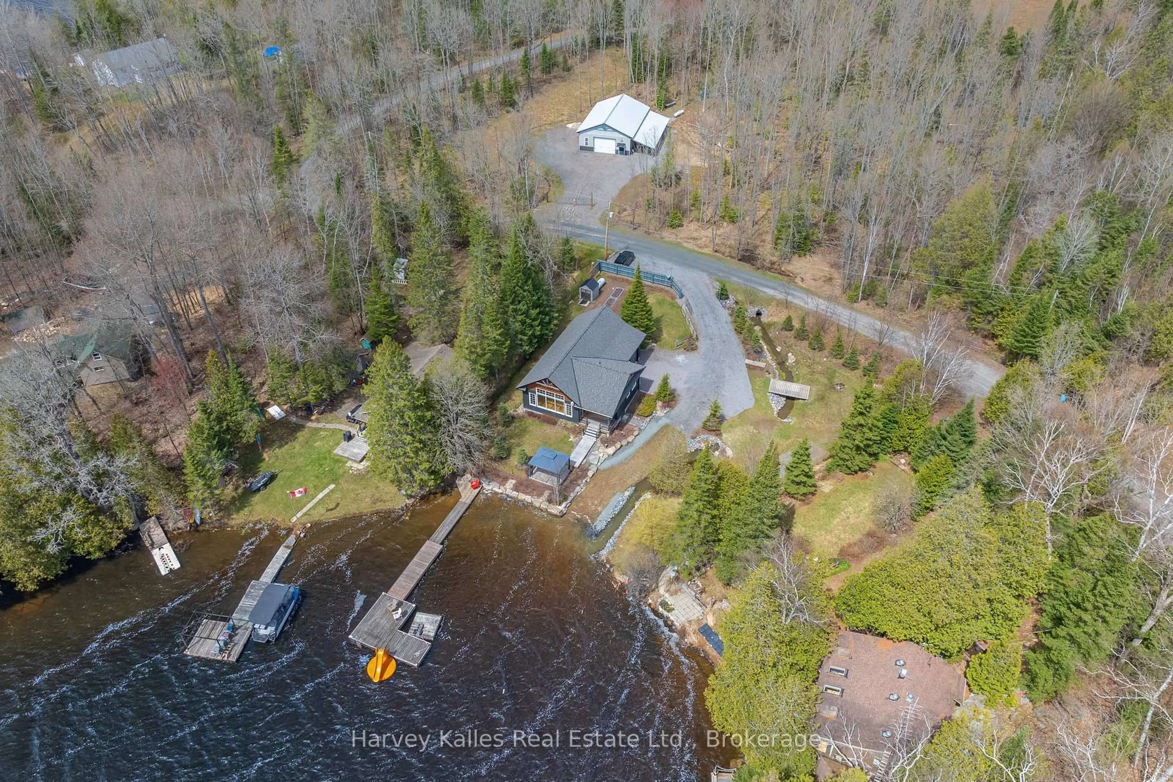 A pic from outside/outdoor area/front of a property/back of a property/a pic from drone, water/lake/river/ocean view for 41 Sunset Cove Rd, Seguin Ontario P2A 0B6