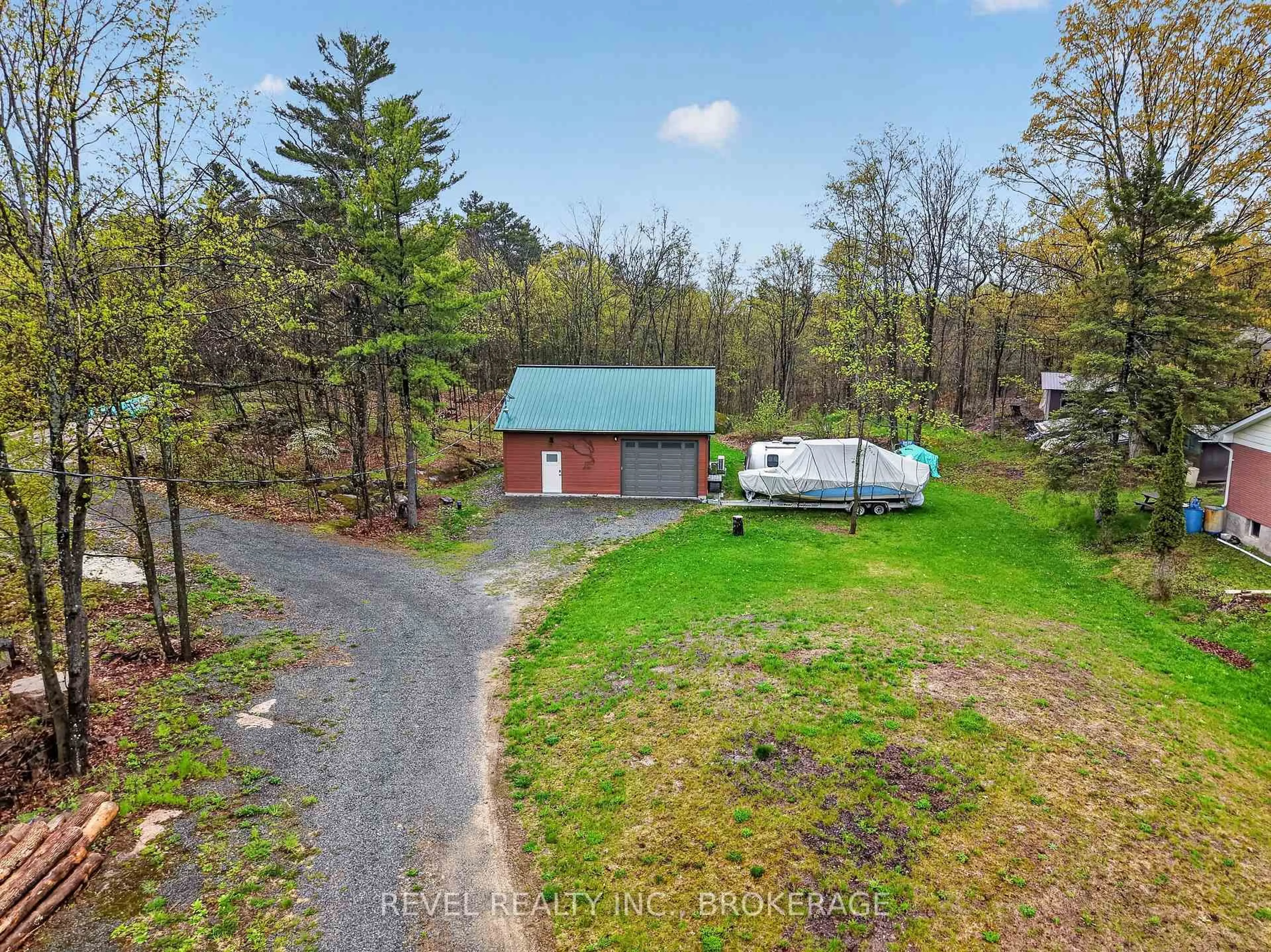 A pic from outside/outdoor area/front of a property/back of a property/a pic from drone, forest/trees view for 2207 Wellington St, Battersea Ontario K0H 1H0