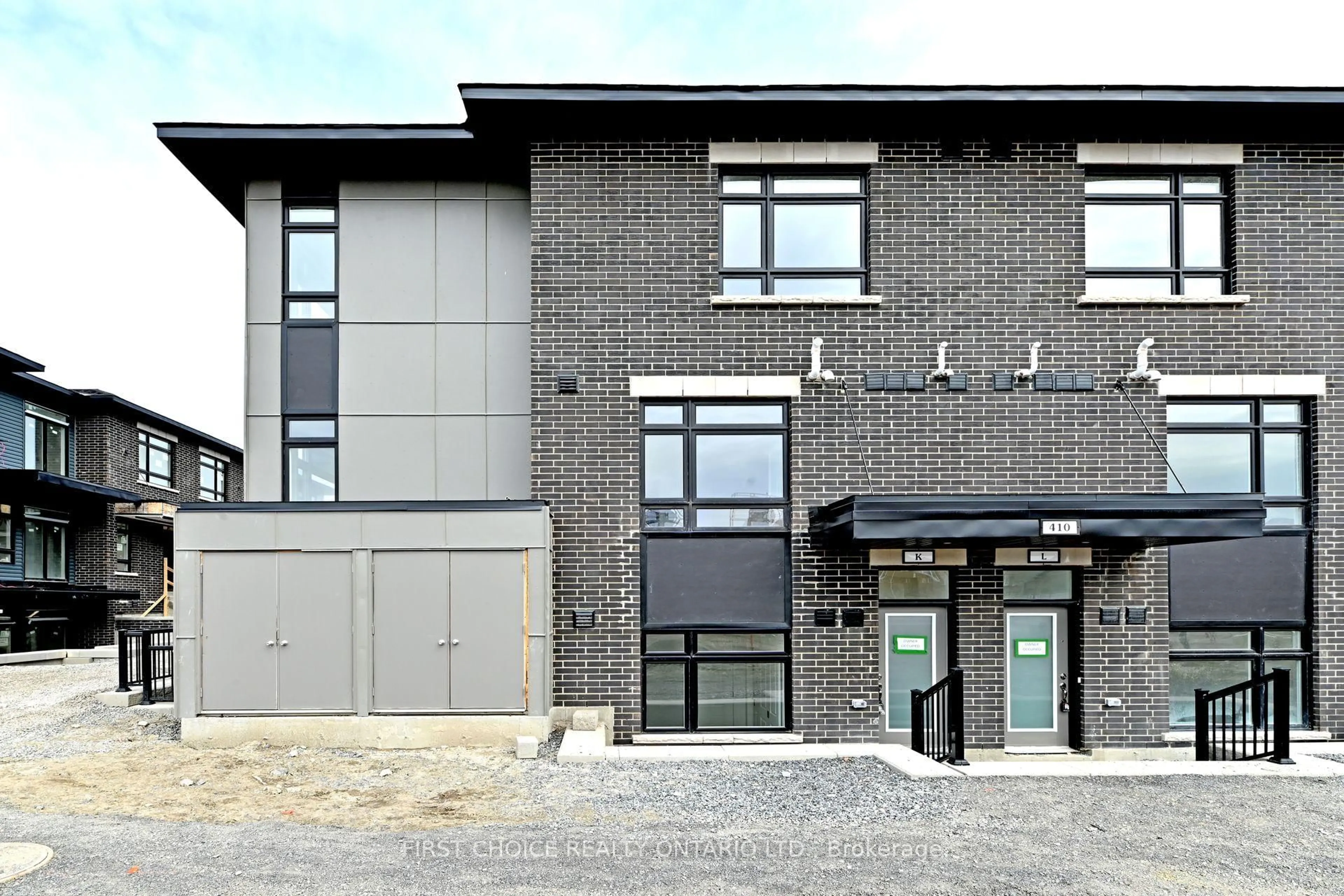 Home with brick exterior material, building for 410 Rolling Meadow Cres #K, Ottawa Ontario K1W 0S1