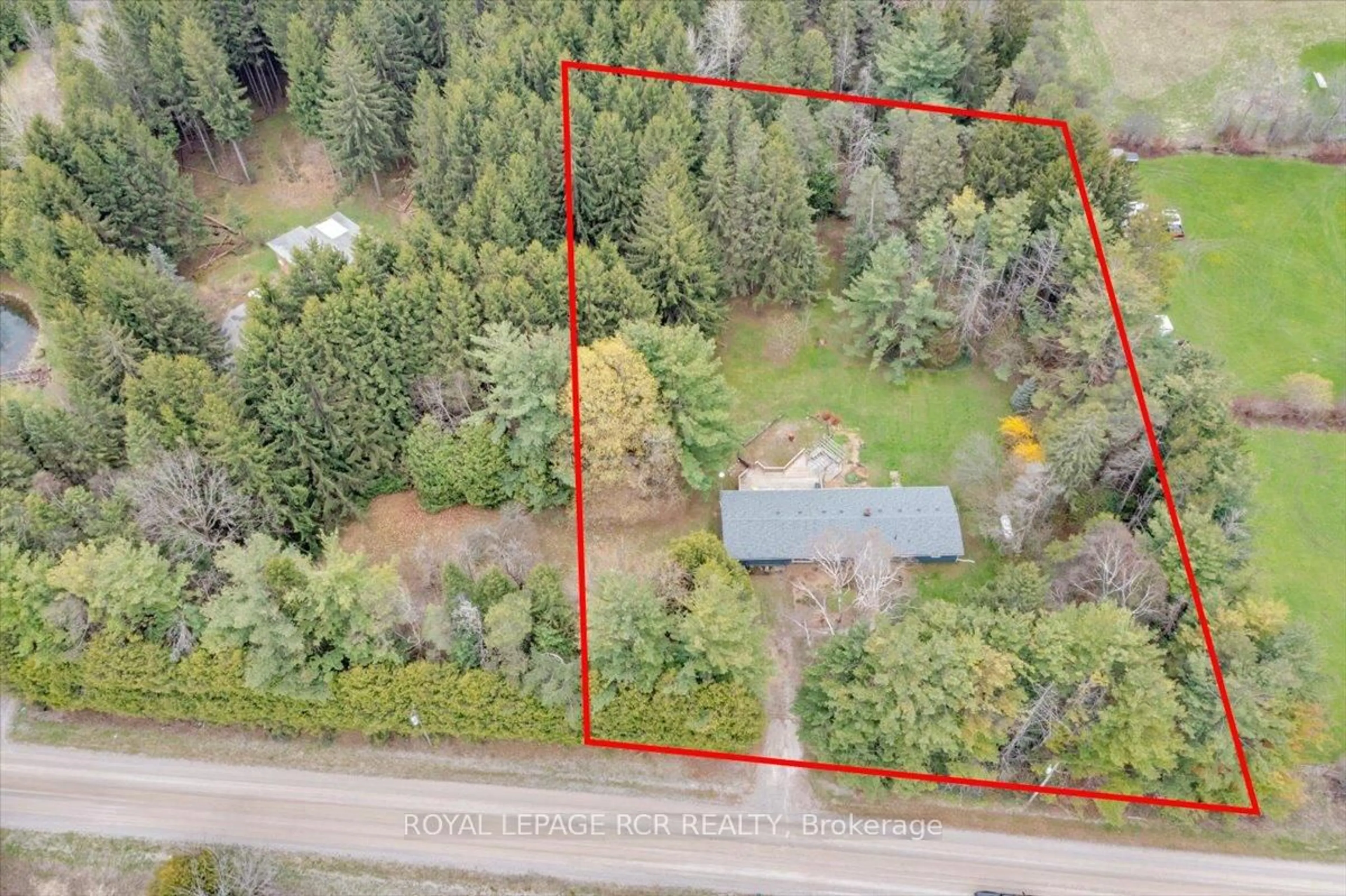 A pic from outside/outdoor area/front of a property/back of a property/a pic from drone, forest/trees view for 111016 11th Line, East Garafraxa Ontario L9W 7A4