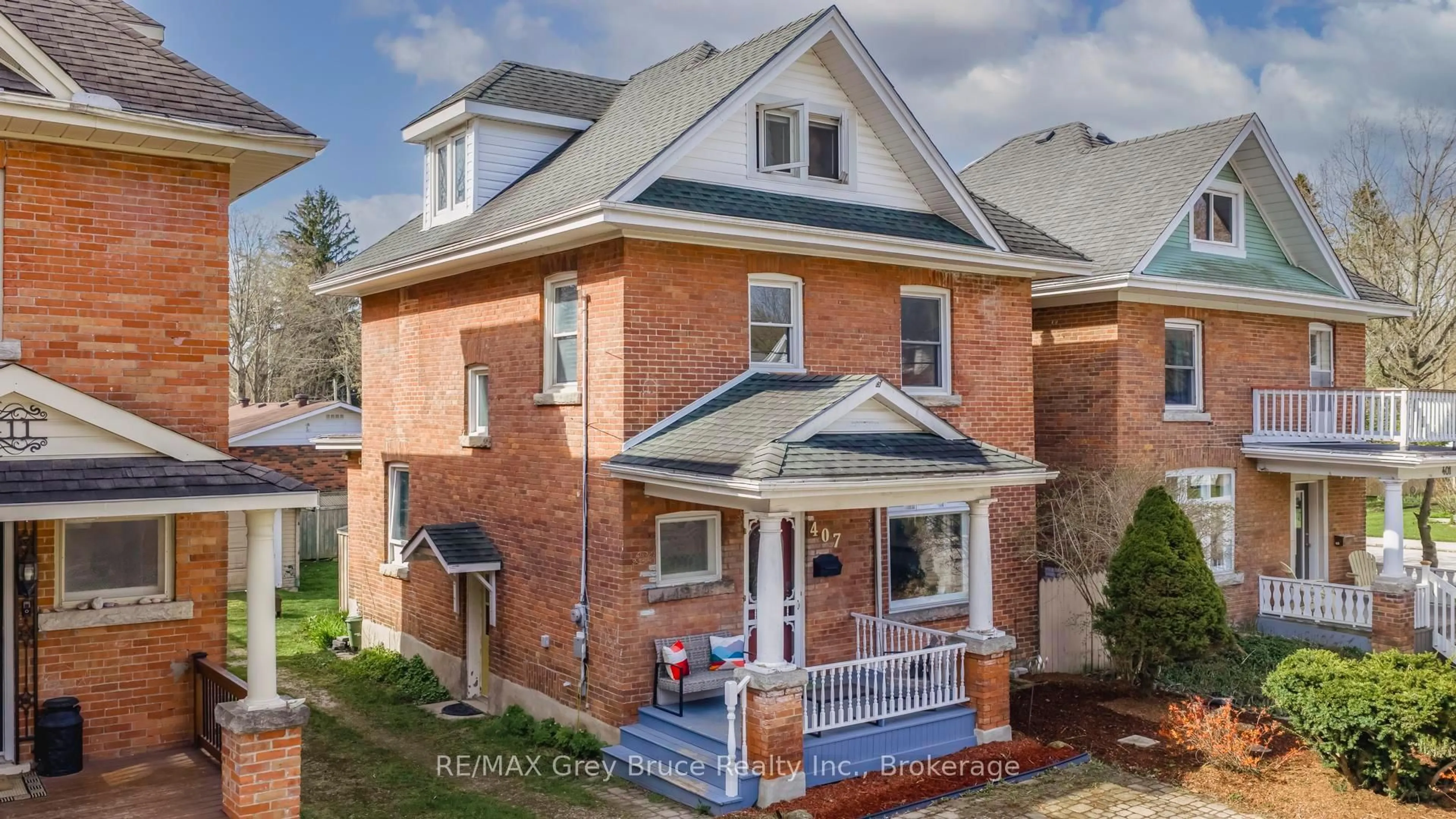 Home with brick exterior material, street for 407 5th St, Owen Sound Ontario N4K 1C9