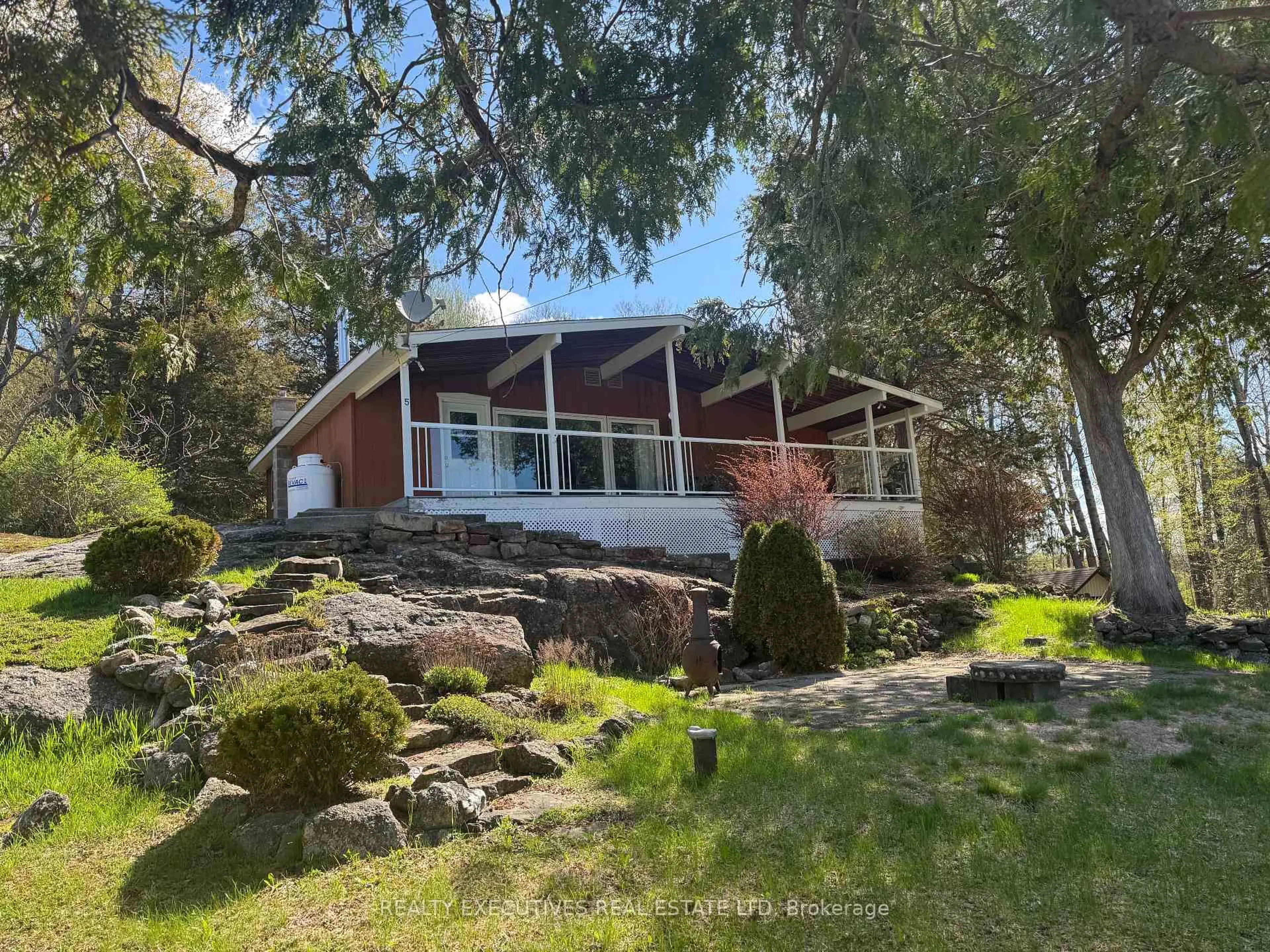 A pic from outside/outdoor area/front of a property/back of a property/a pic from drone, unknown for 5 Lake Shore Dr, Rideau Lakes Ontario K0E 1G0
