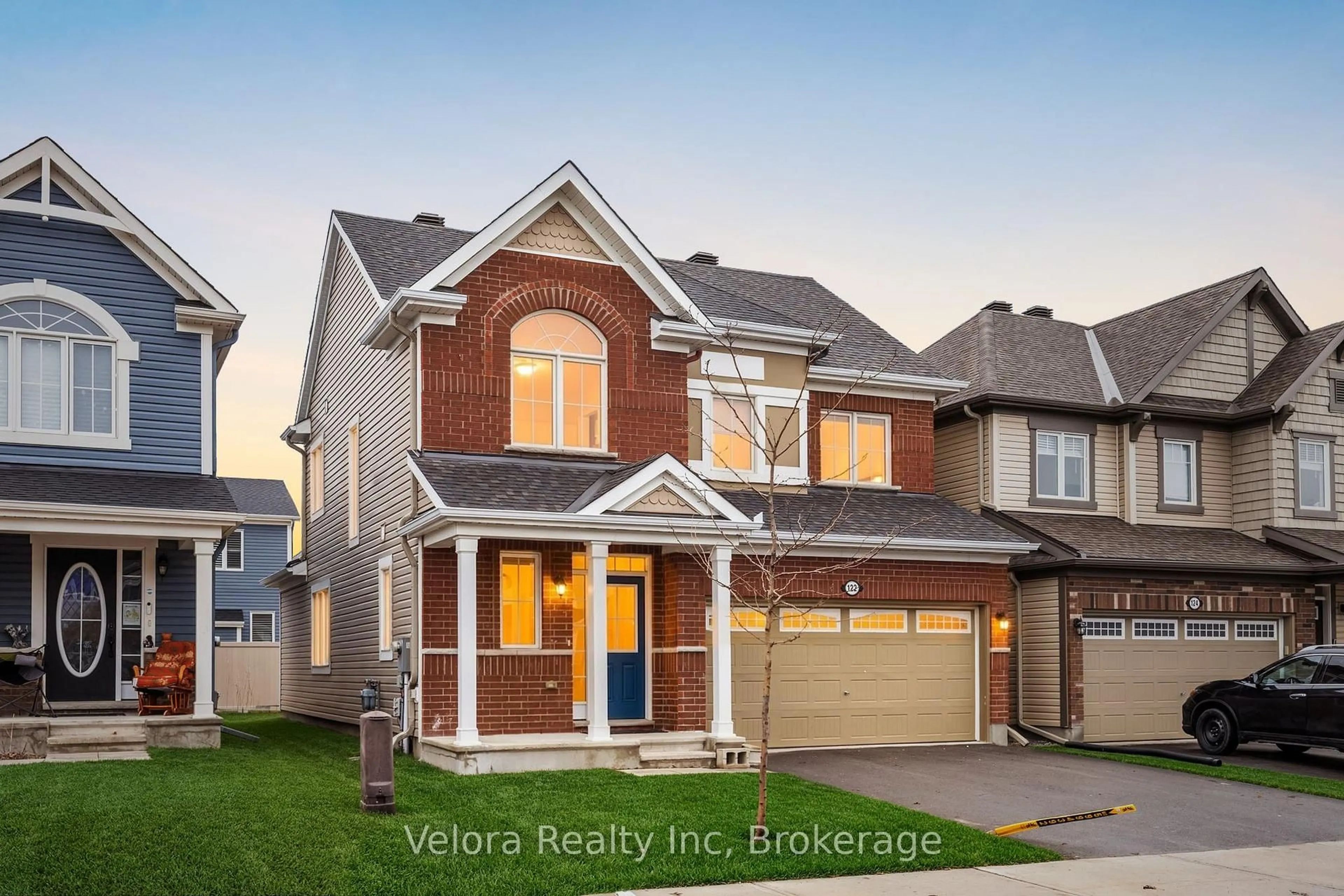 Home with brick exterior material, street for 122 Cranesbill Rd, Ottawa Ontario K2V 0J5