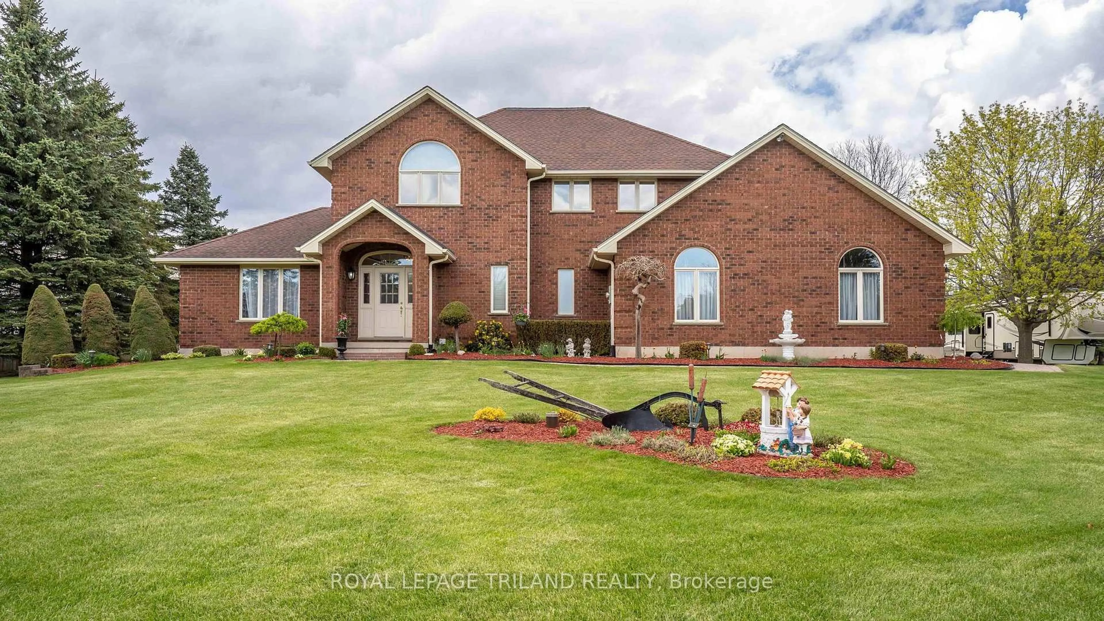 Home with brick exterior material, unknown for 42720 MEADOW WOOD Lane, Central Elgin Ontario N0L 2L0