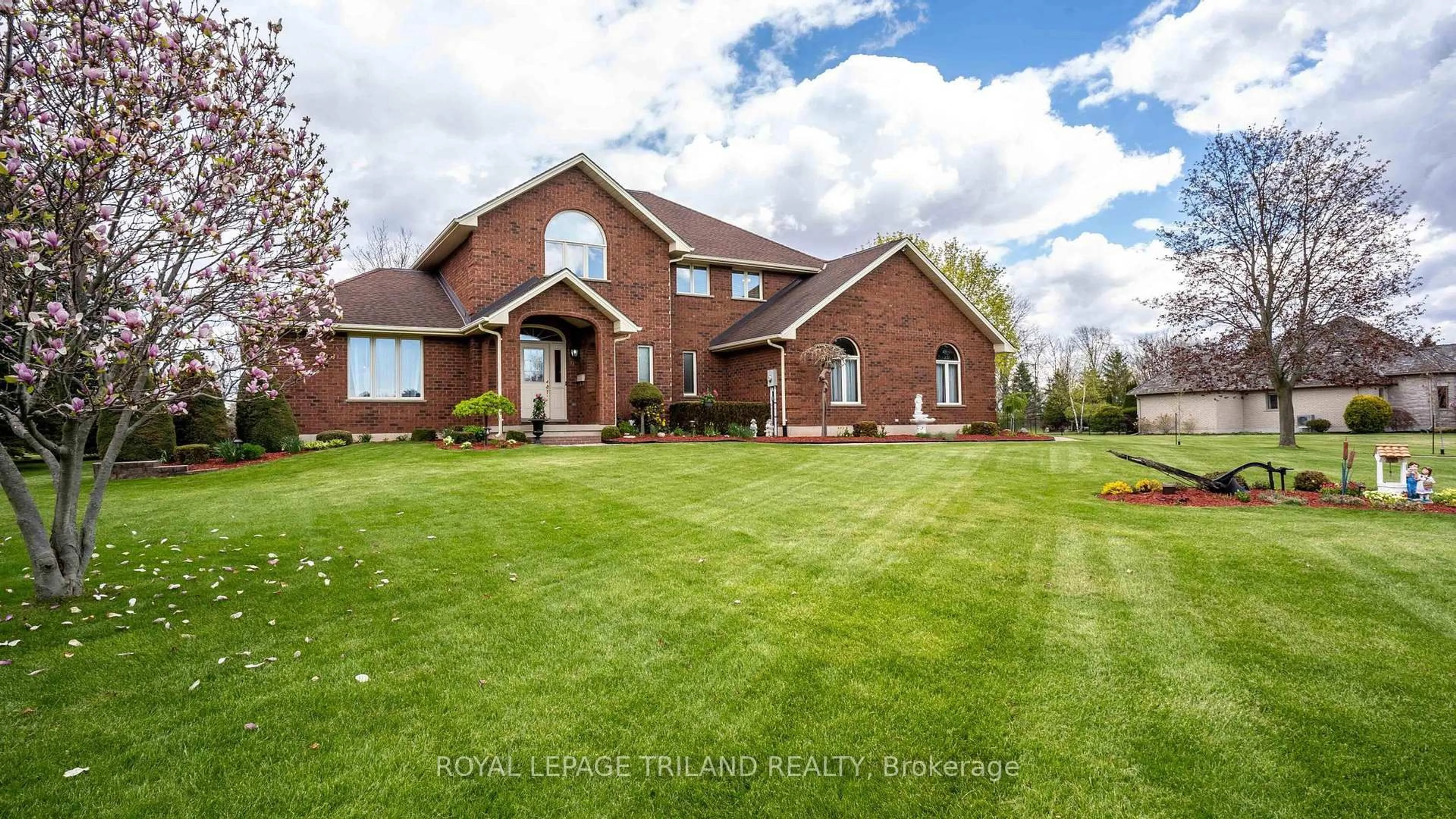 Home with brick exterior material, unknown for 42720 MEADOW WOOD Lane, Central Elgin Ontario N0L 2L0