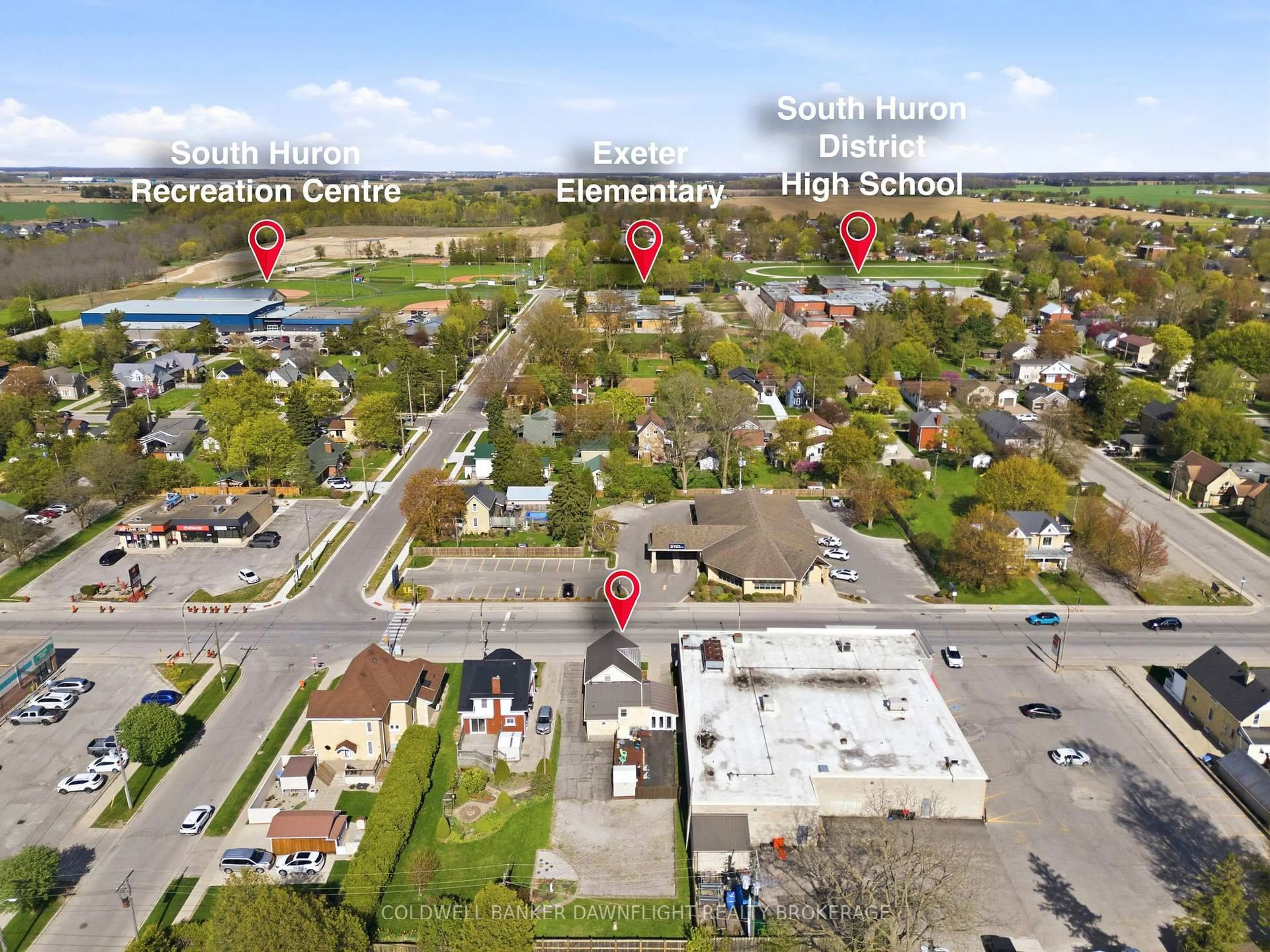 A pic from outside/outdoor area/front of a property/back of a property/a pic from drone, street for 221 Main St, South Huron Ontario N0M 1S6