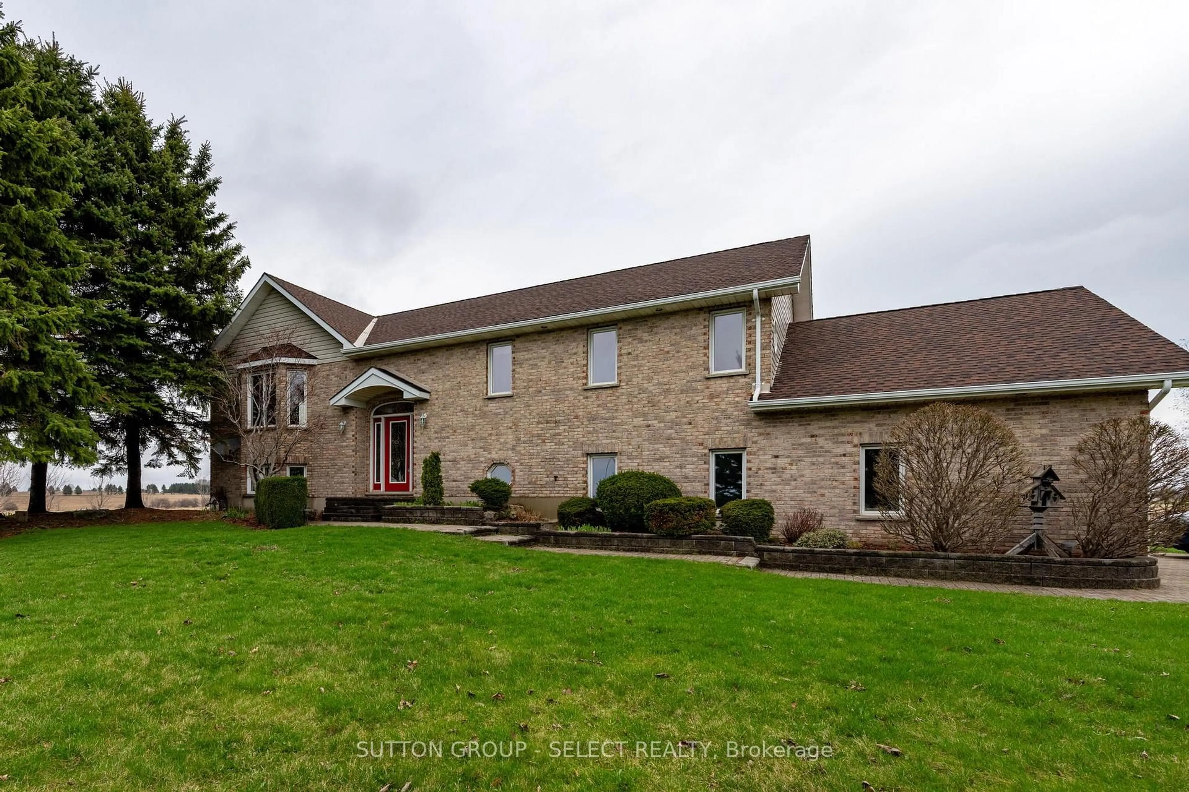 Home with brick exterior material, street for 77242 London Rd, Huron East Ontario N0M 1L0