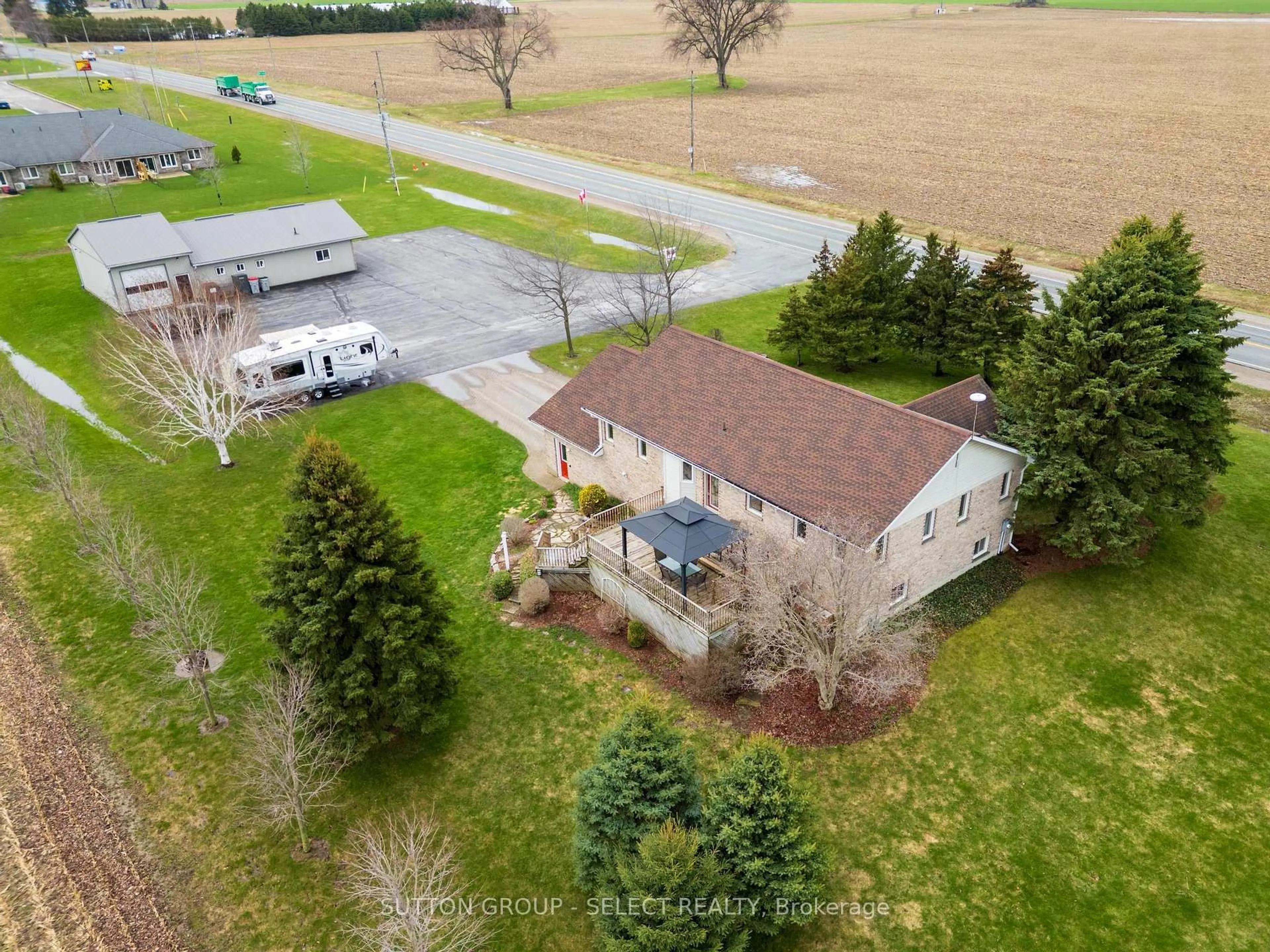 A pic from outside/outdoor area/front of a property/back of a property/a pic from drone, street for 77242 London Rd, Huron East Ontario N0M 1L0