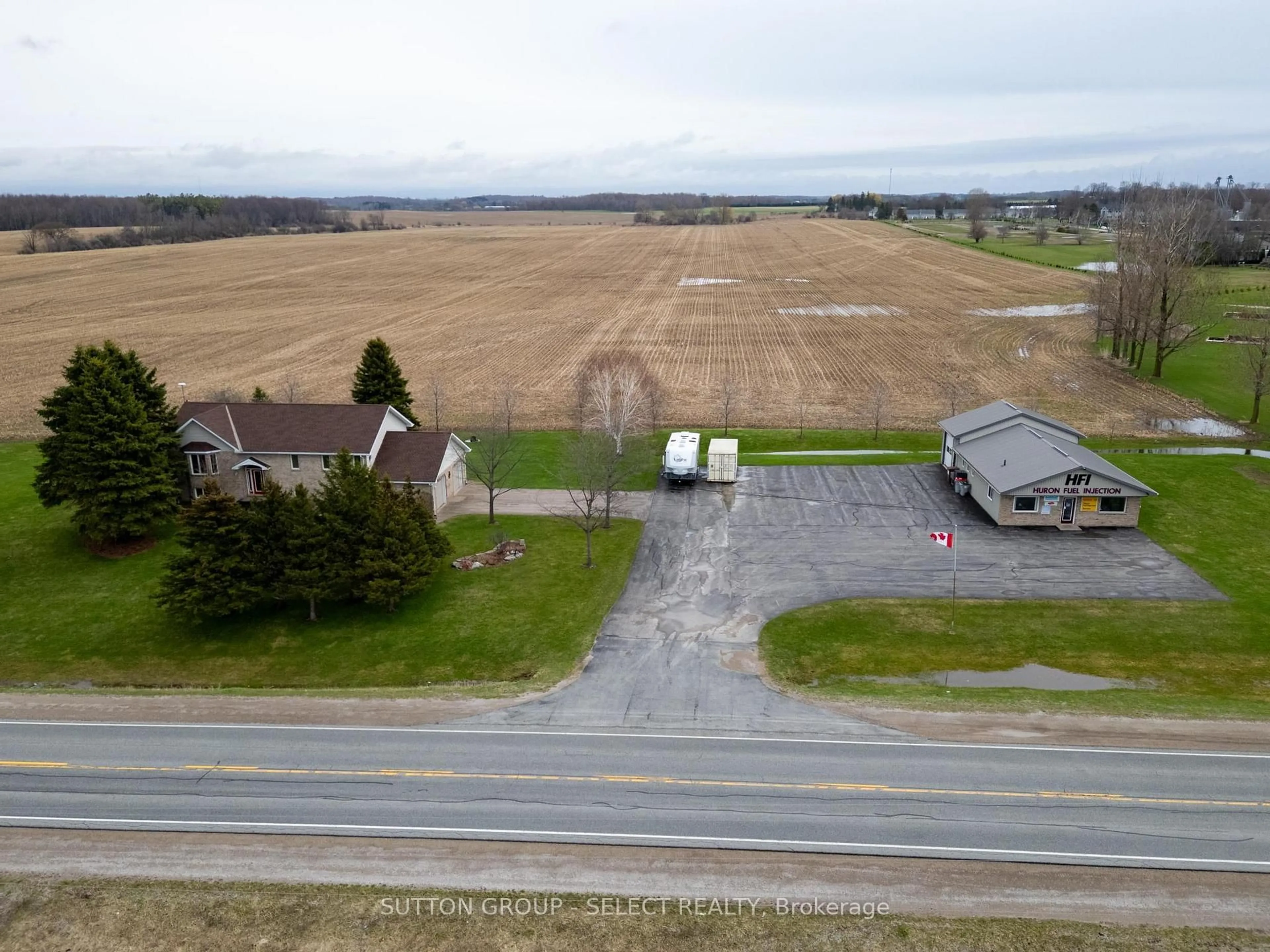 A pic from outside/outdoor area/front of a property/back of a property/a pic from drone, street for 77242 London Rd, Huron East Ontario N0M 1L0